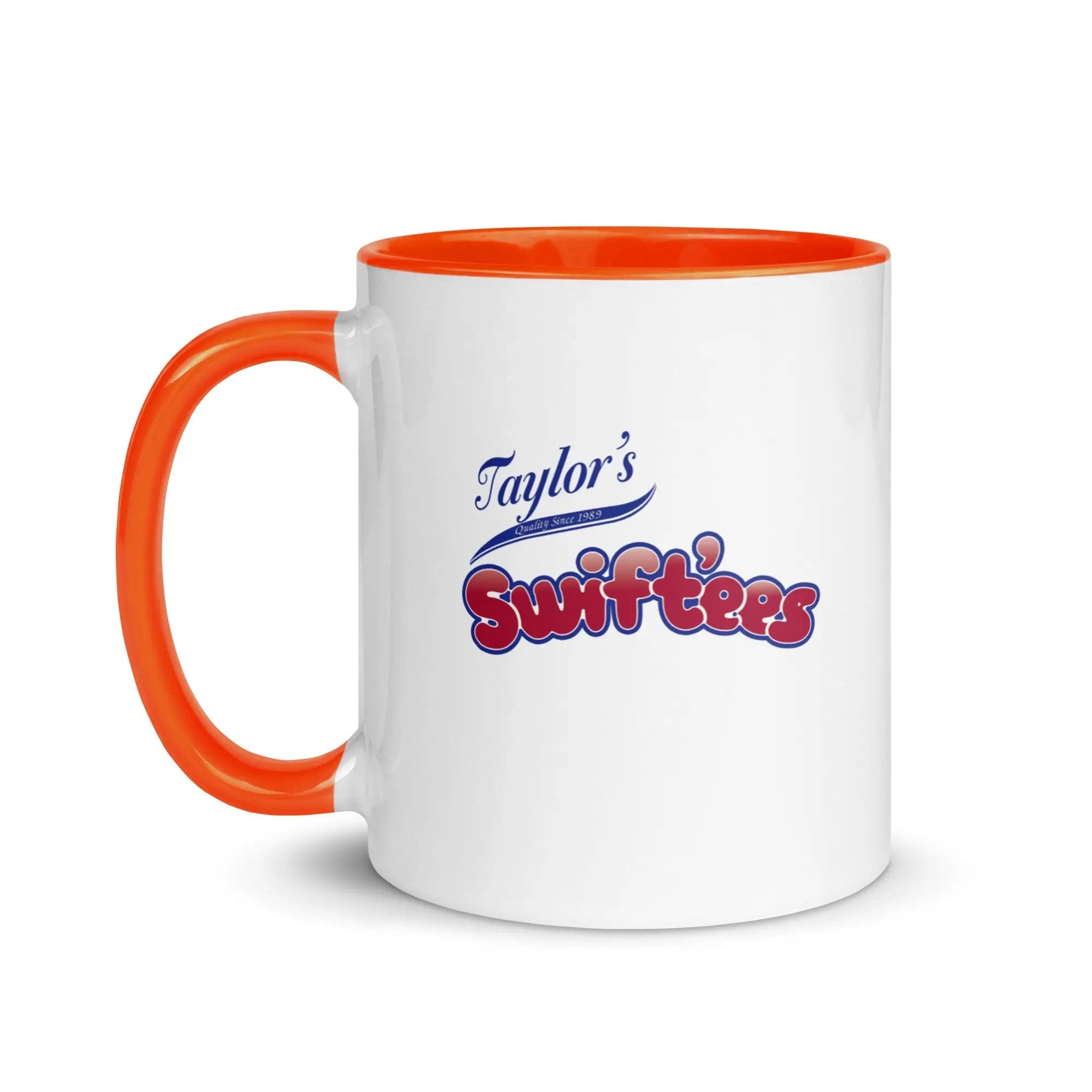 a white and orange coffee mug with the words taylor's softies on it