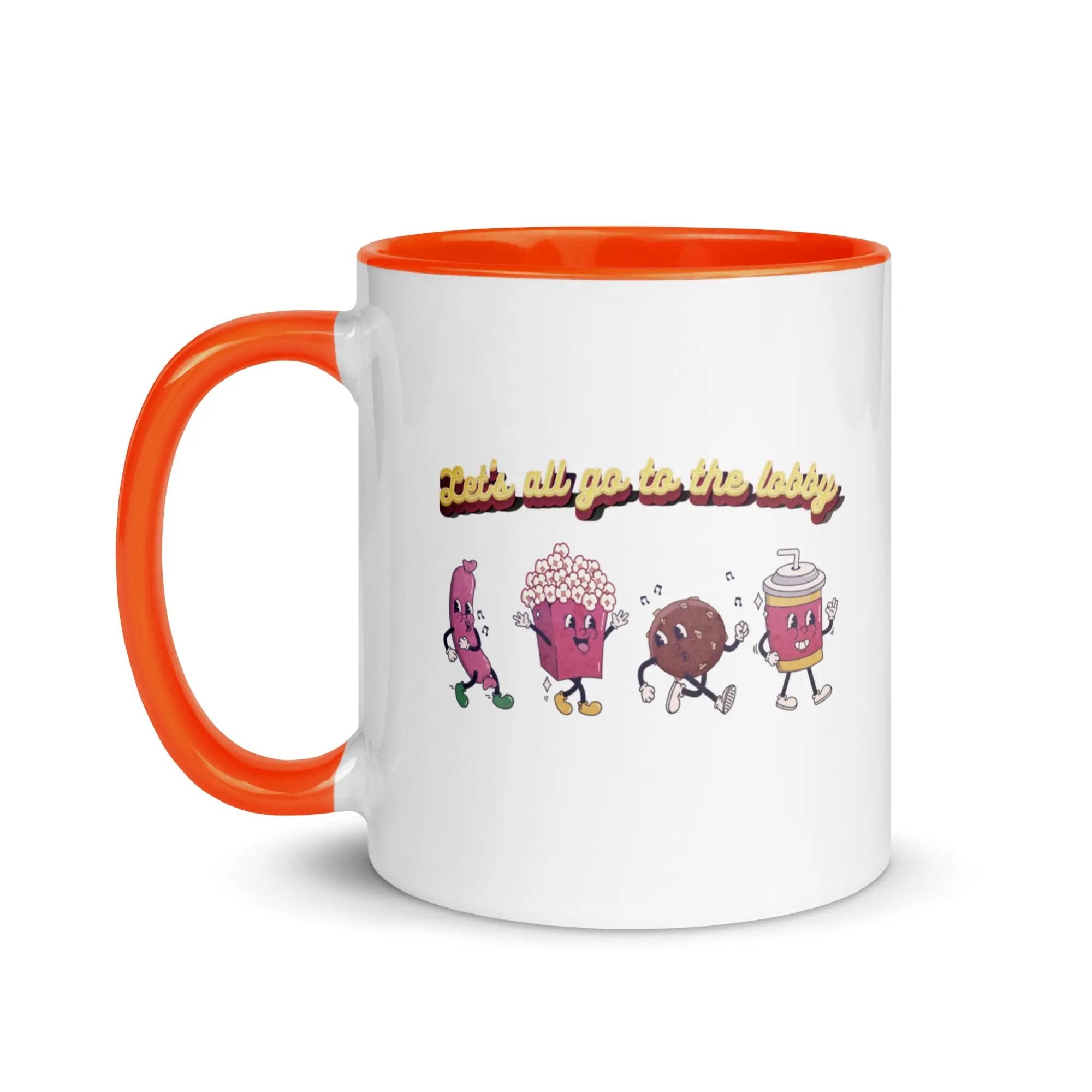 a white and orange coffee mug with cartoon characters on it