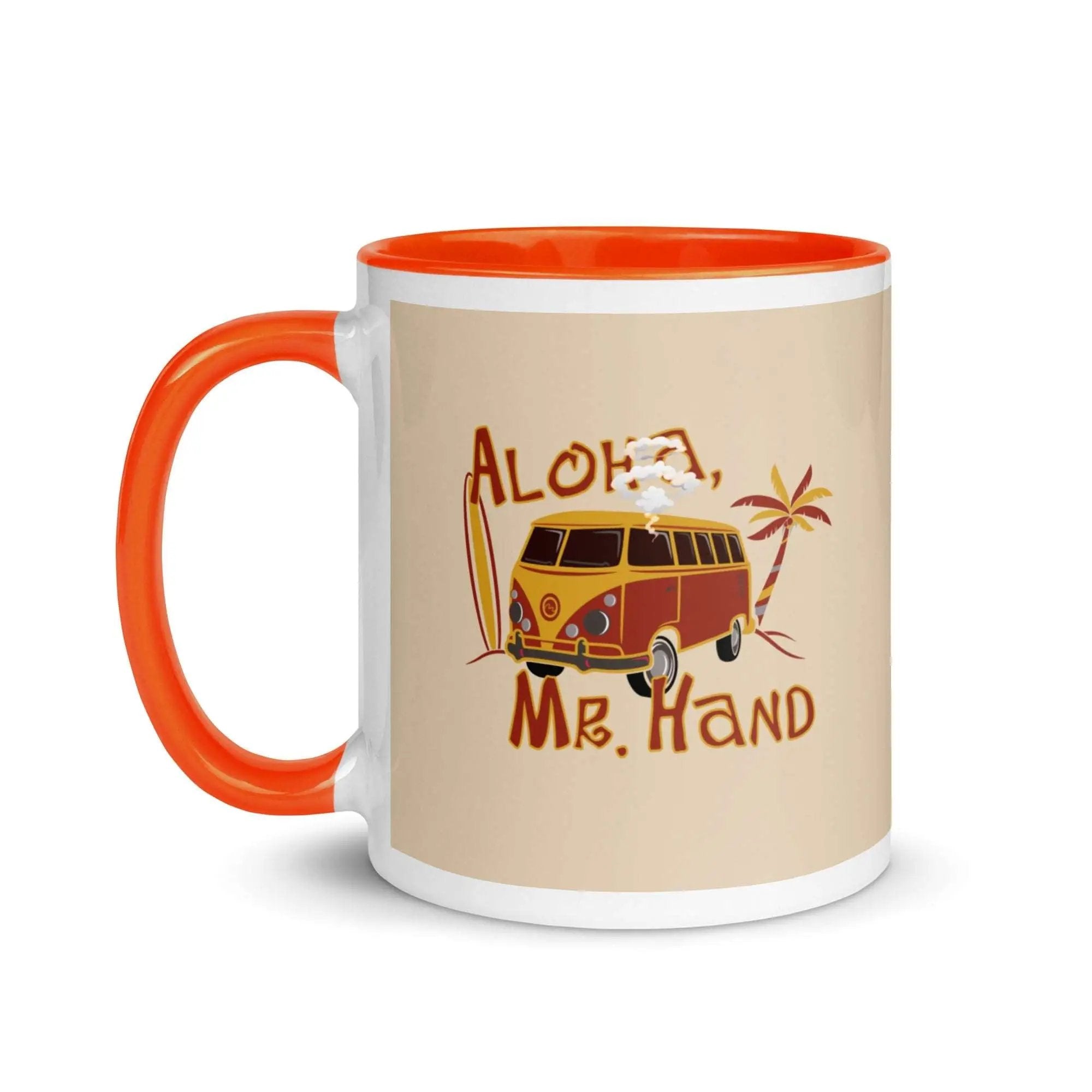an orange and white coffee mug with an orange handle