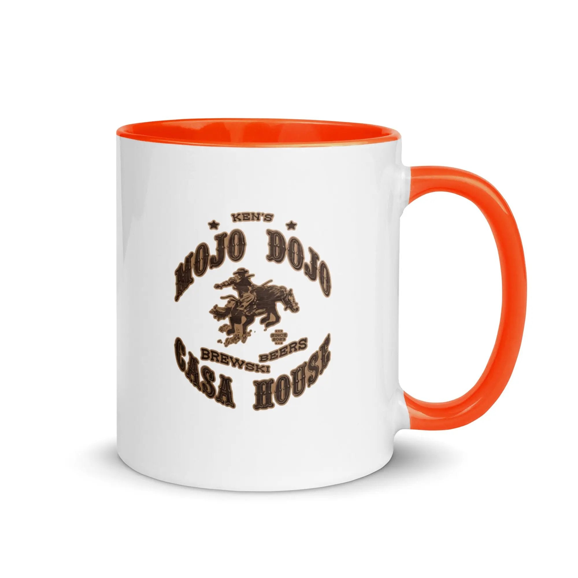 a white and orange coffee mug with a horse on it