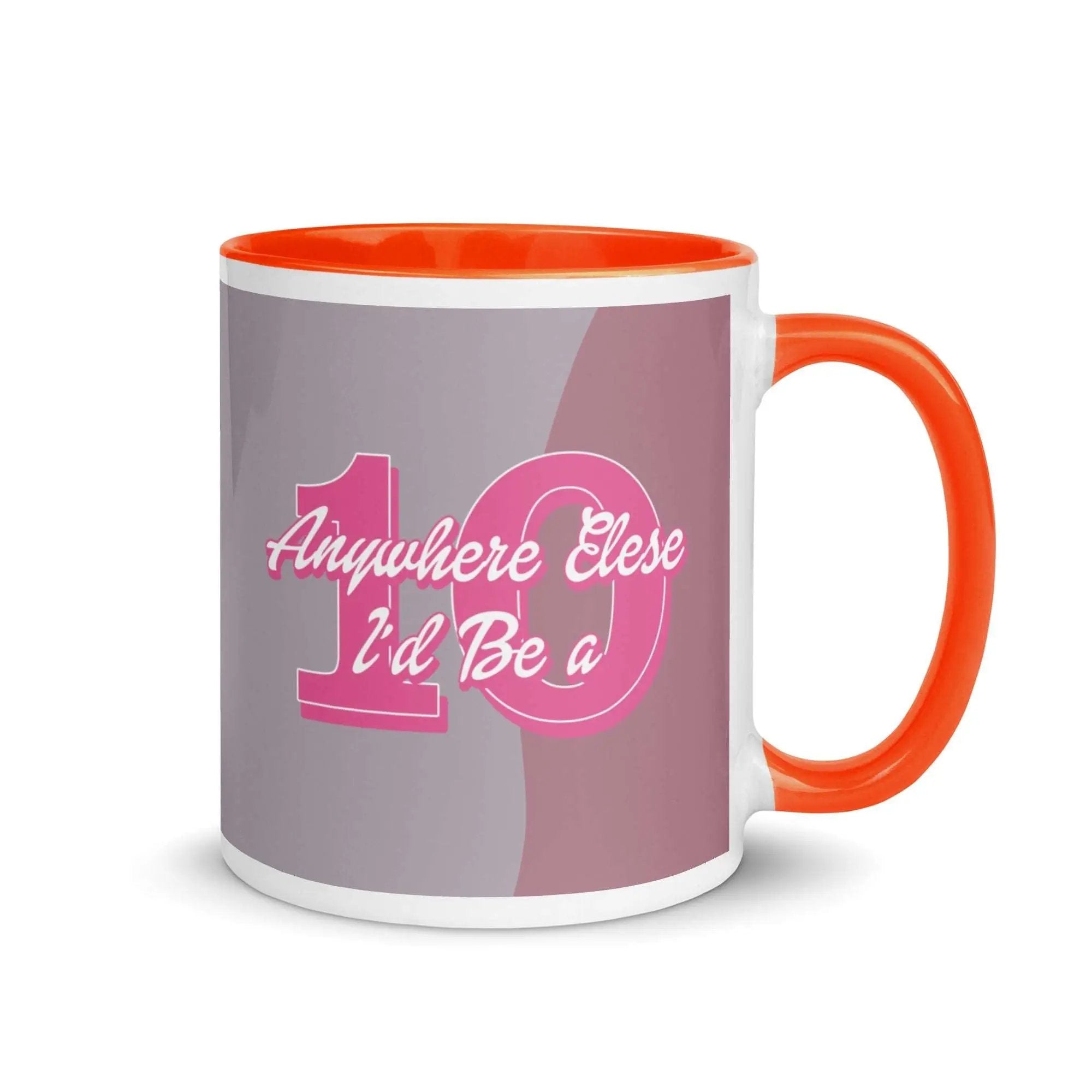 an orange and white coffee mug with a pink handle