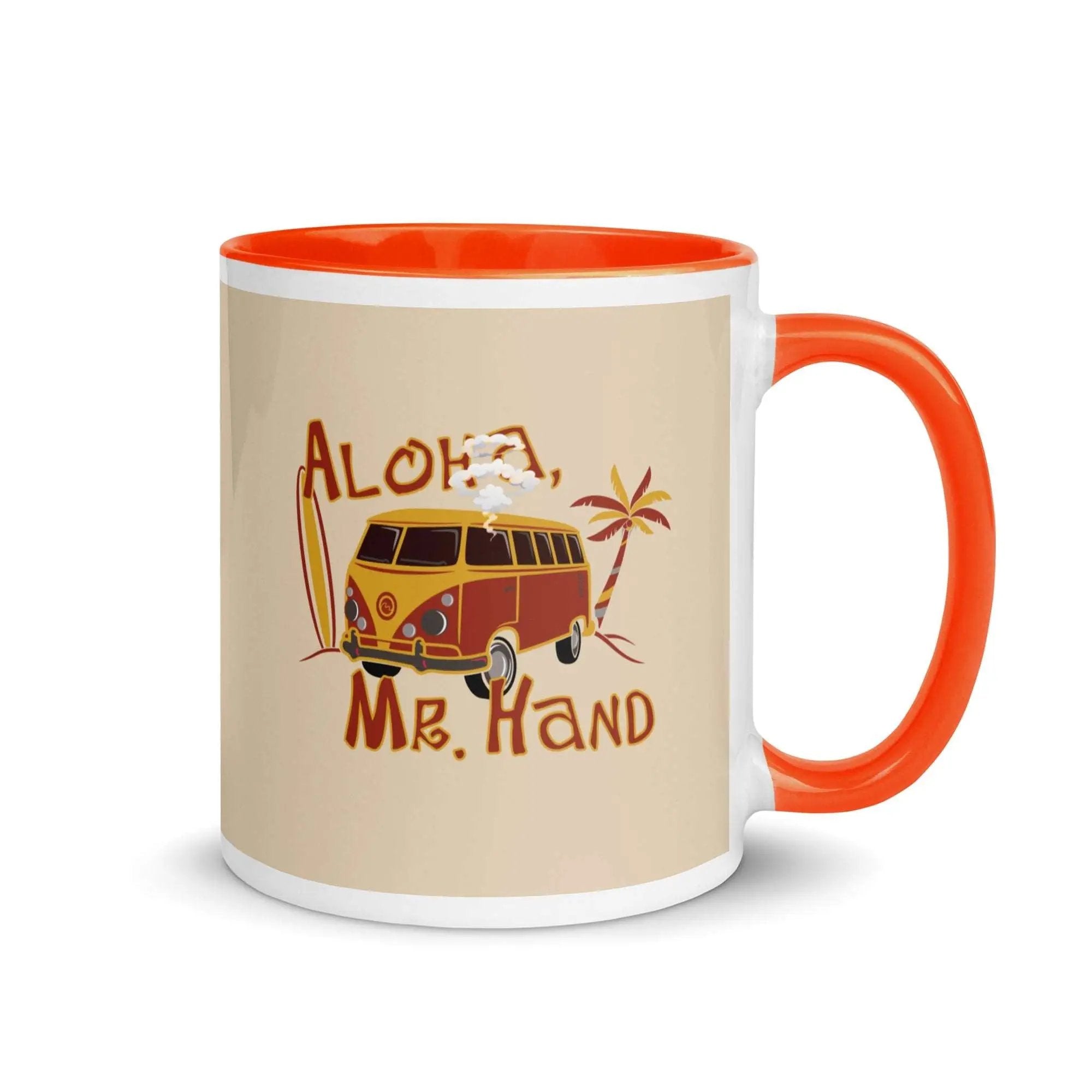 an orange and white coffee mug with an orange handle