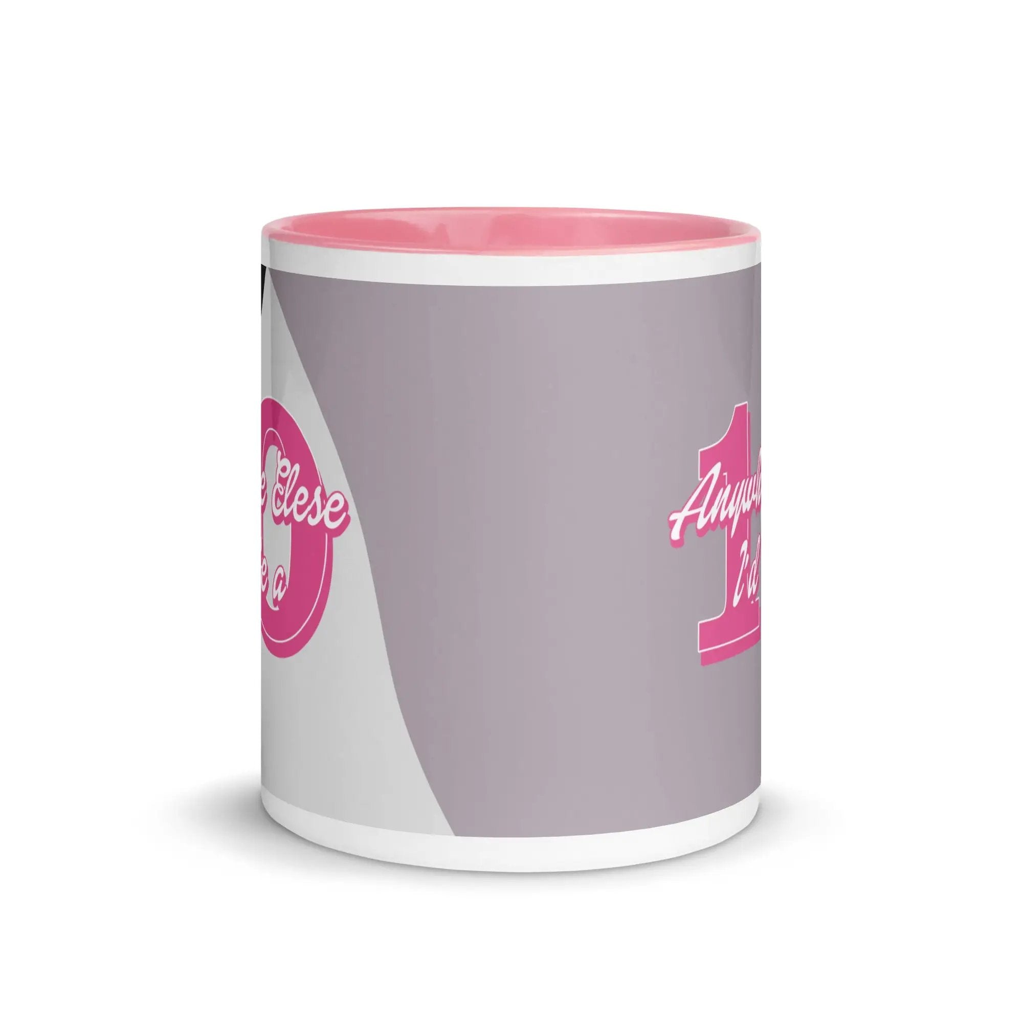 a pink and white coffee mug with a pink handle