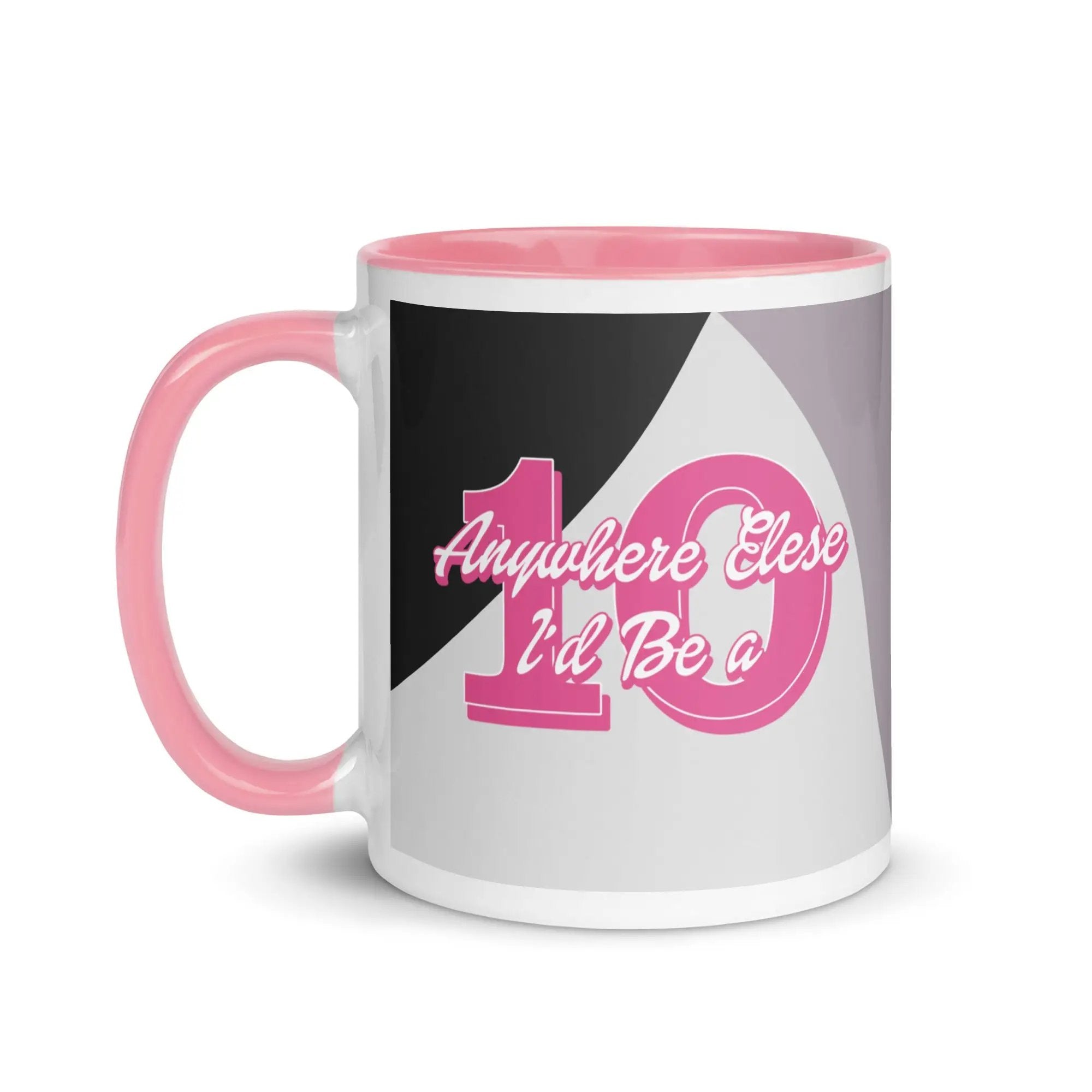 a pink and white coffee mug with the number one on it