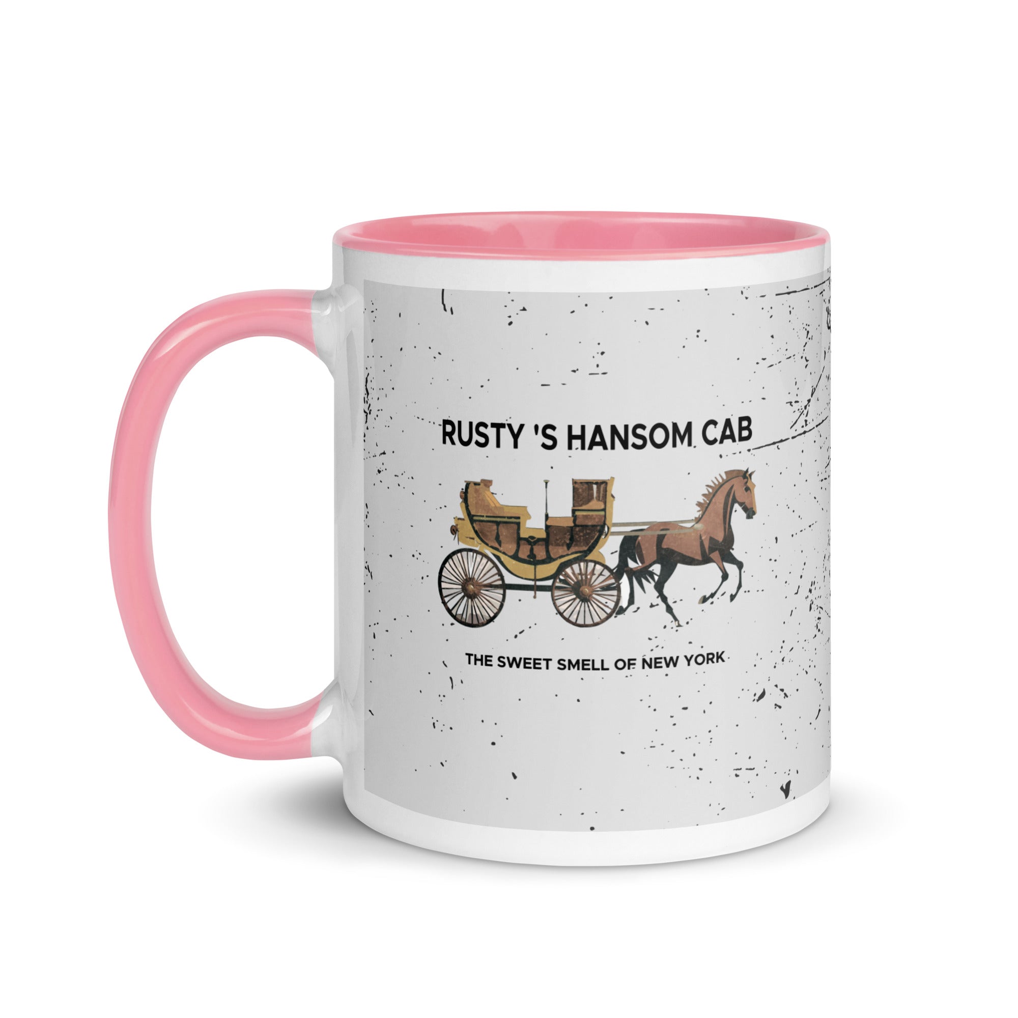 a pink and white coffee mug with a horse drawn carriage