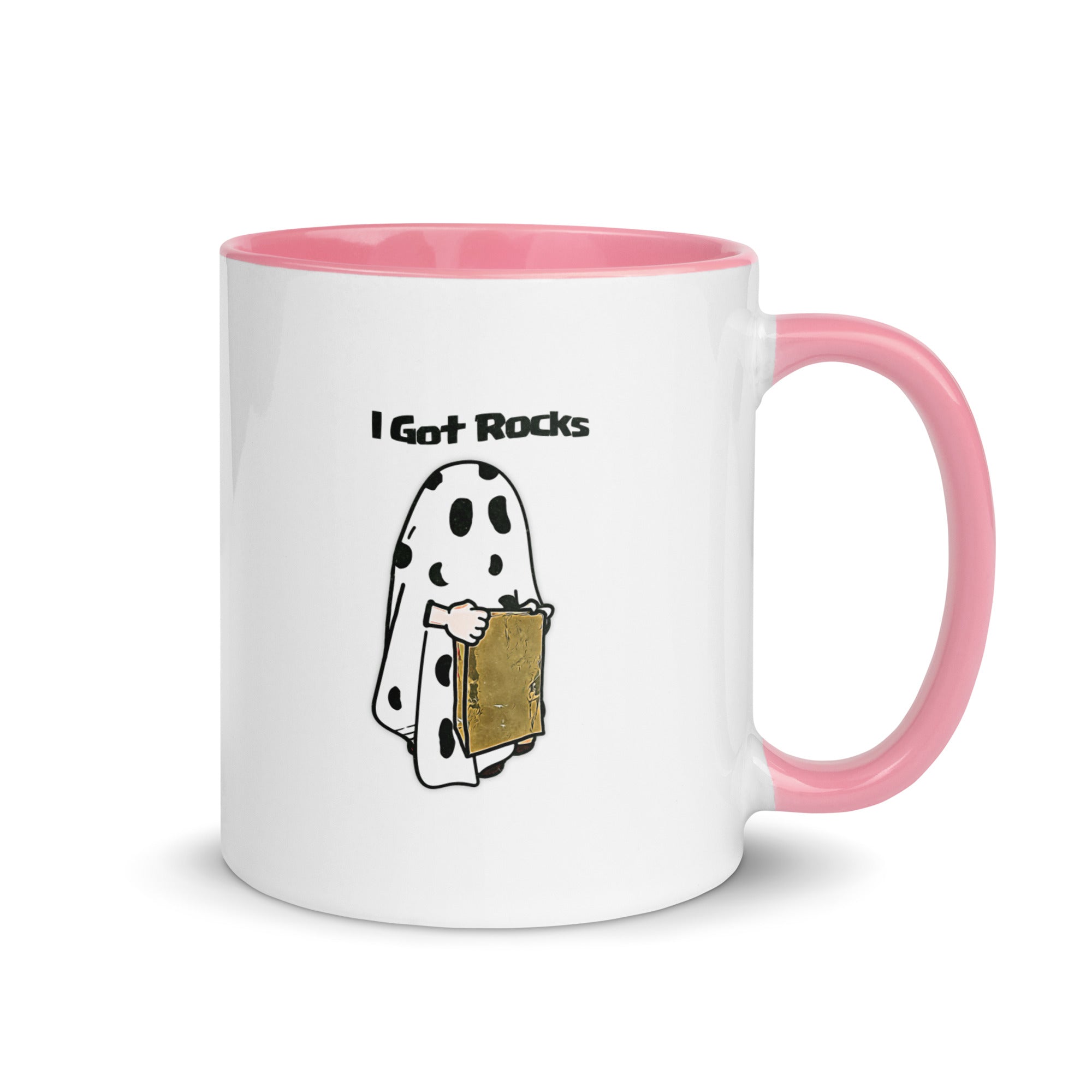 a white and pink coffee mug with a cartoon character holding a box