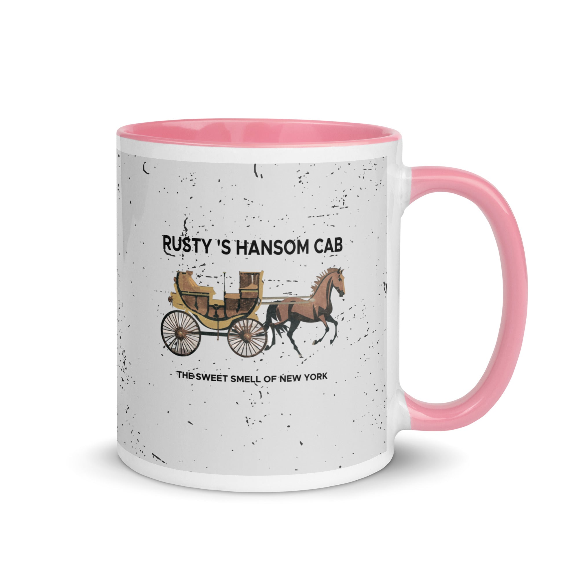 a pink and white coffee mug with a horse drawn carriage