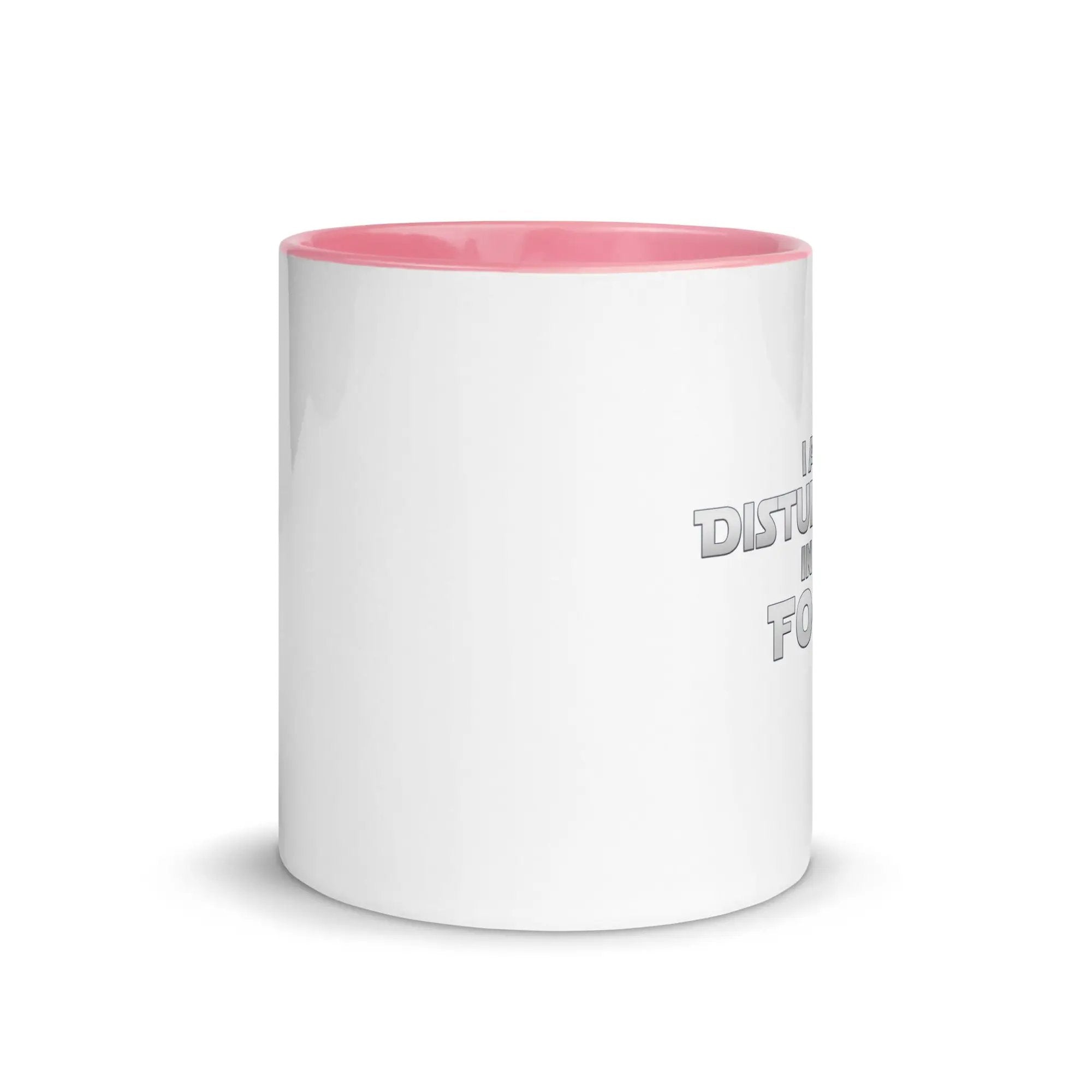a white and pink coffee mug with a pink rim