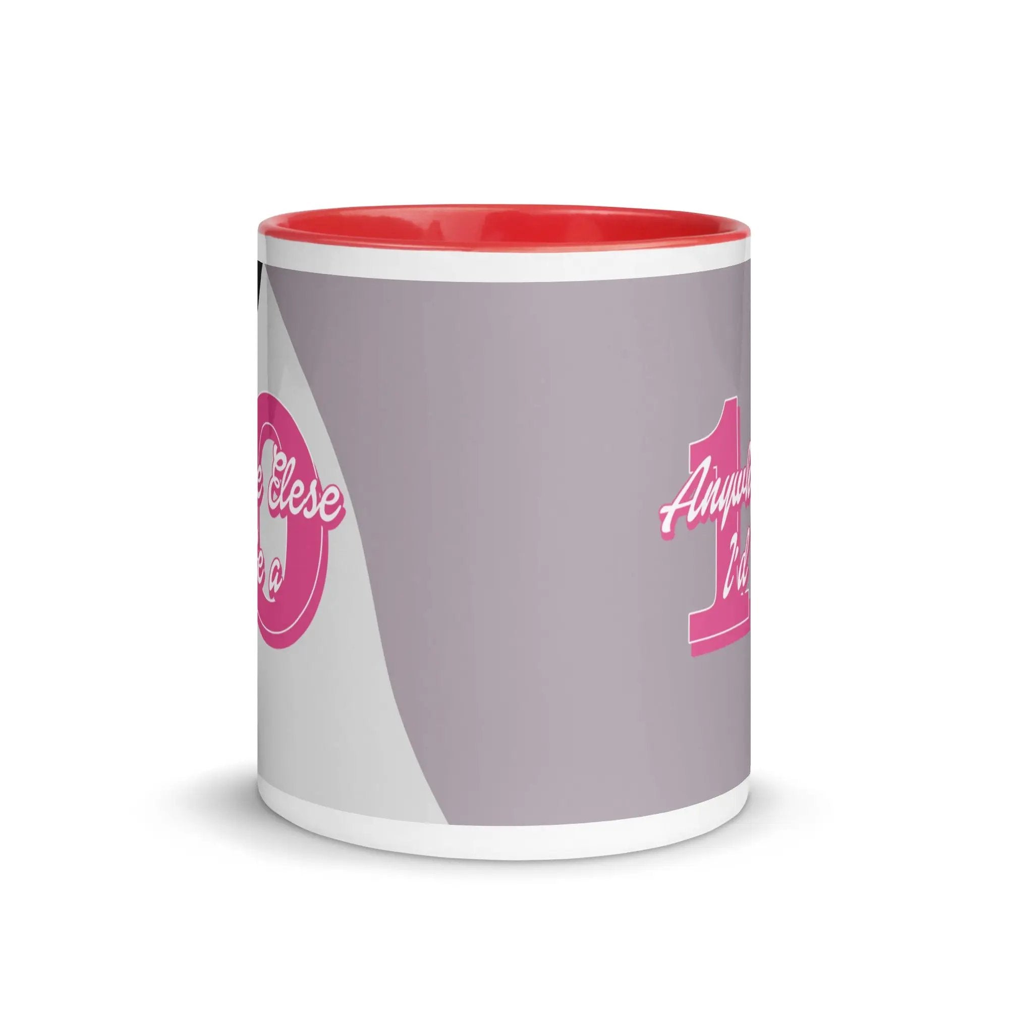 a pink and white coffee mug with a pink handle