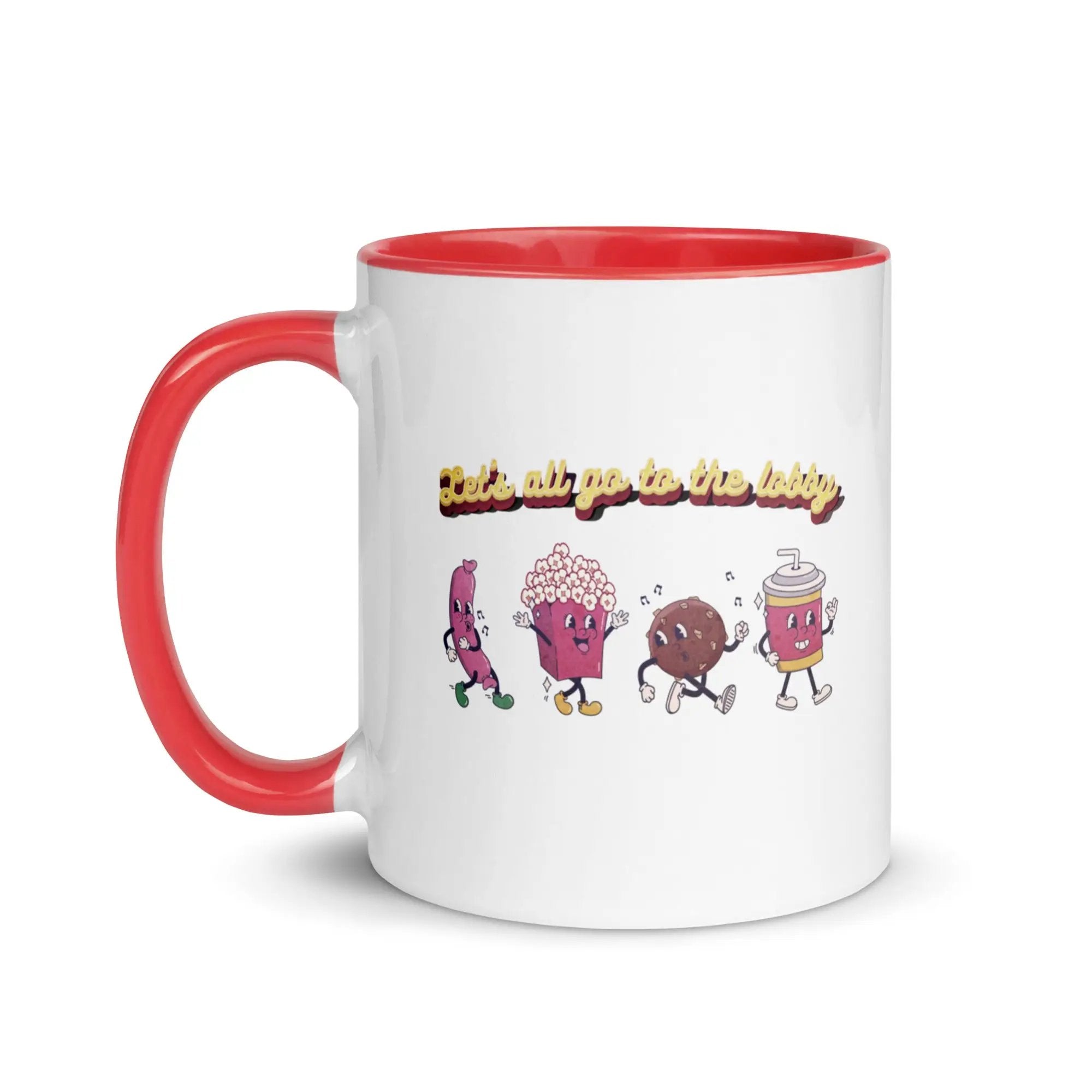 a red and white coffee mug with cartoon characters on it