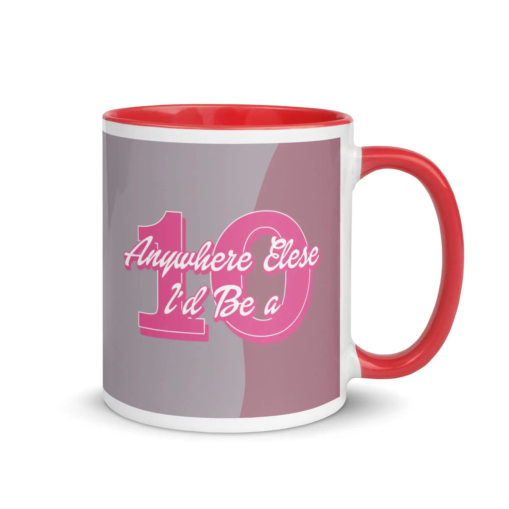 a red and white coffee mug with a pink handle