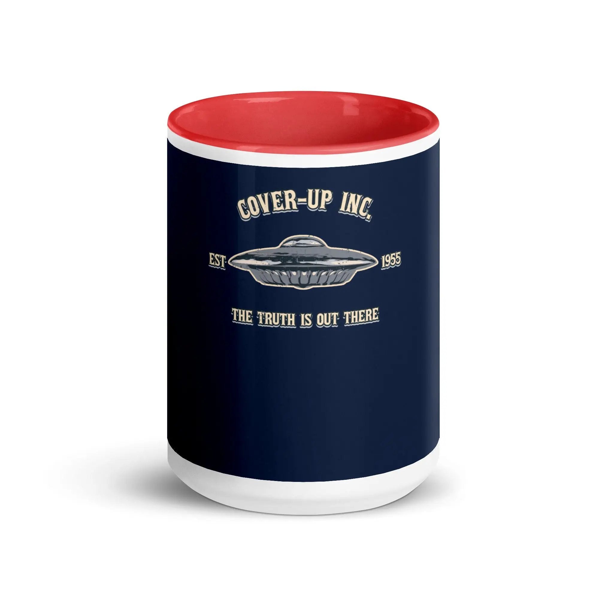 a red and white coffee mug with the words cover - up inc on it