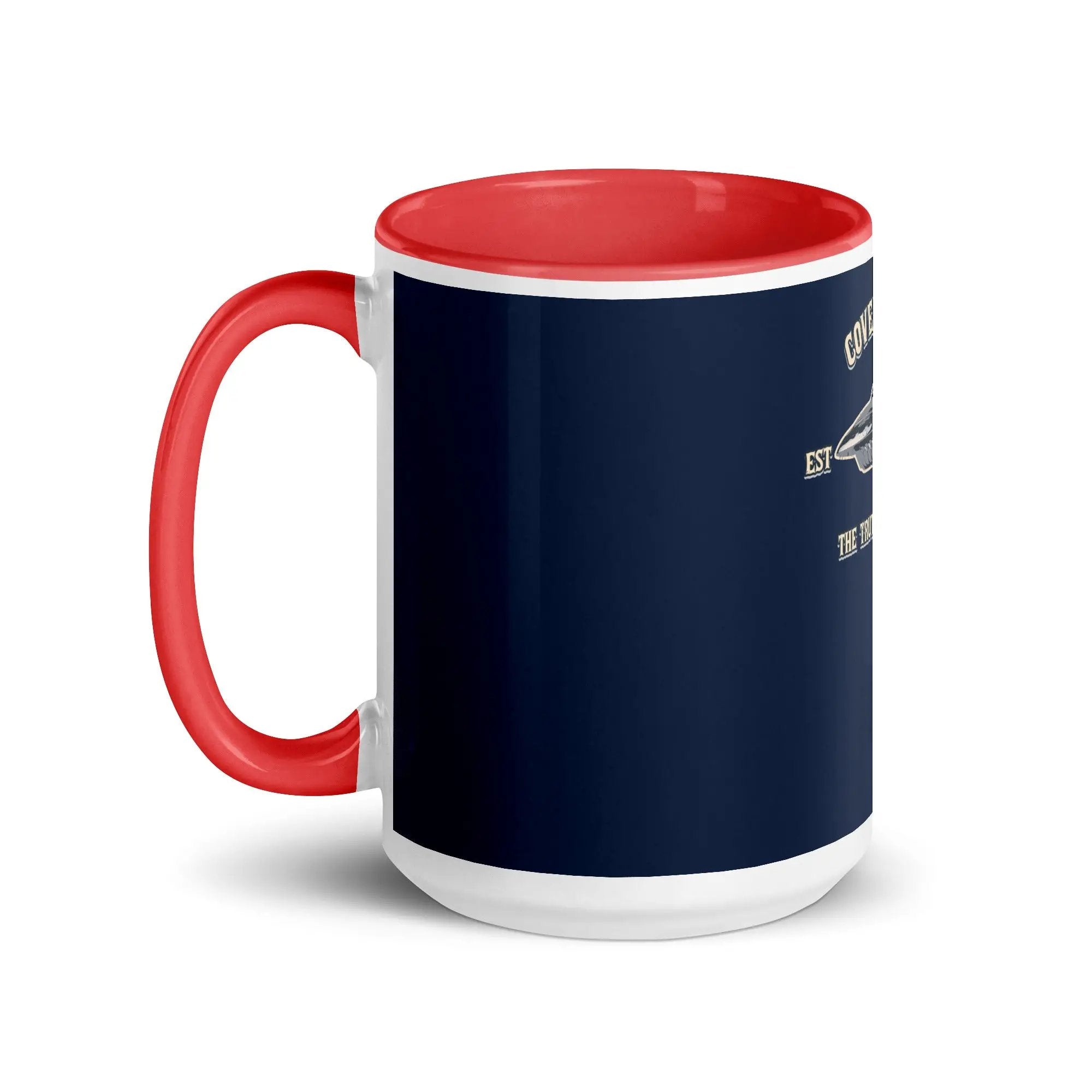 a blue and red coffee mug with a red handle