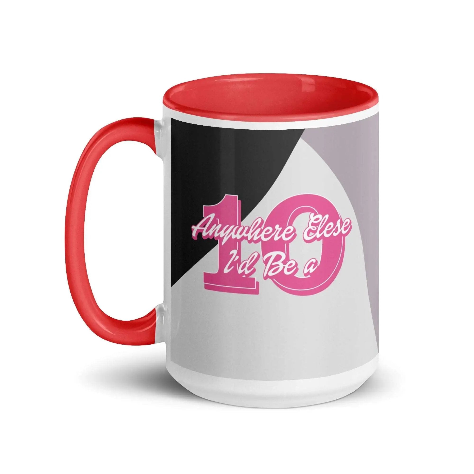 a red and white coffee mug with a pink handle