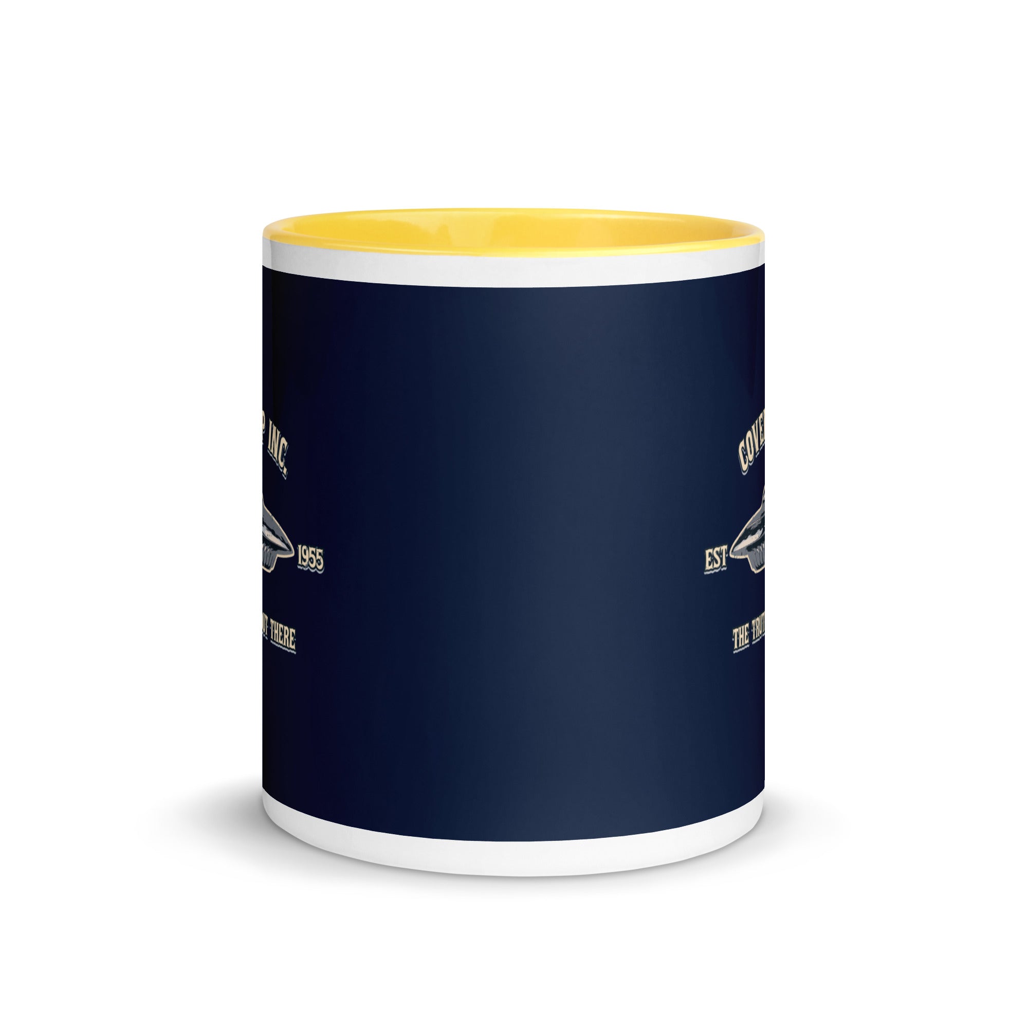 a blue and white coffee mug with a yellow rim