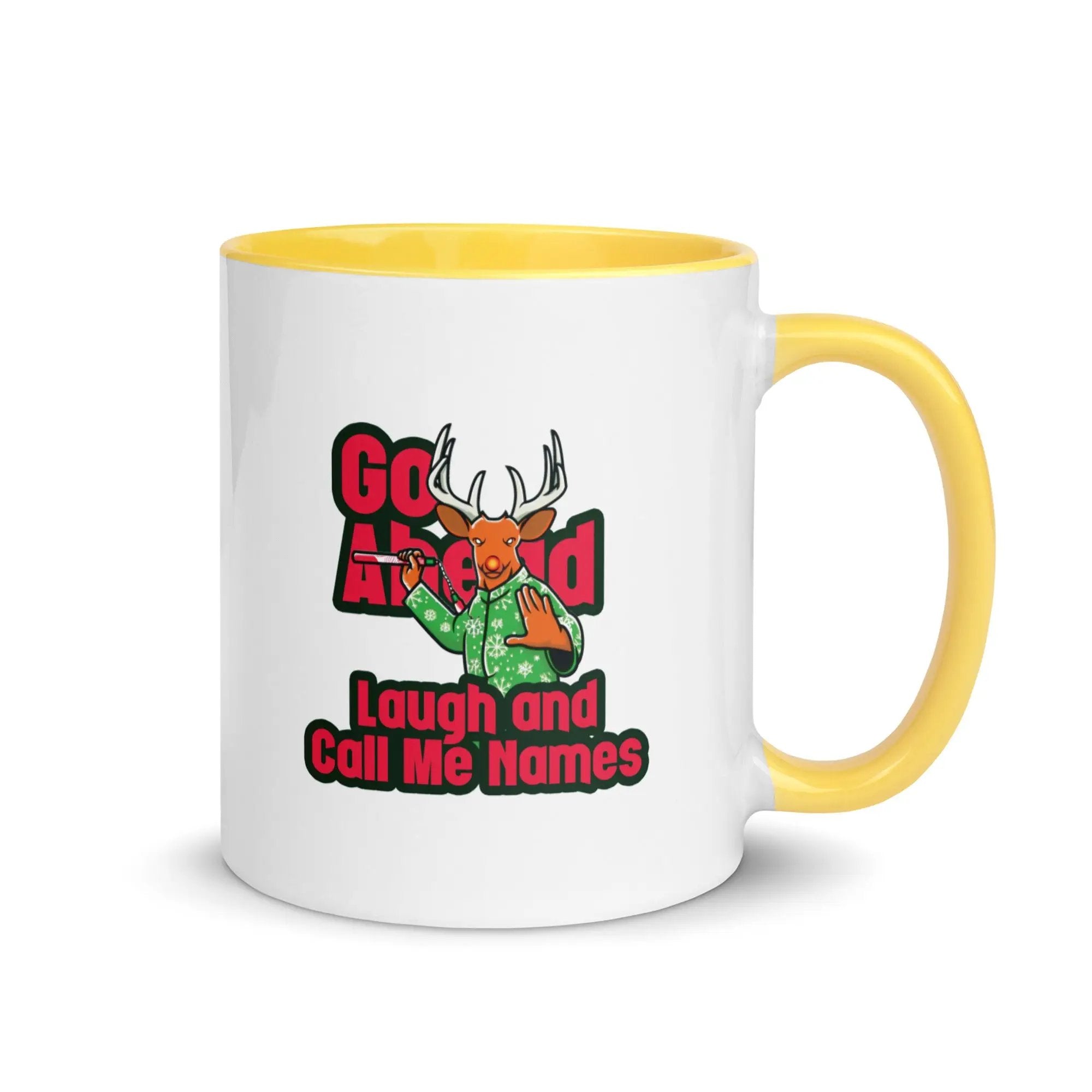 a white and yellow coffee mug with the words go ahead laugh and call me names