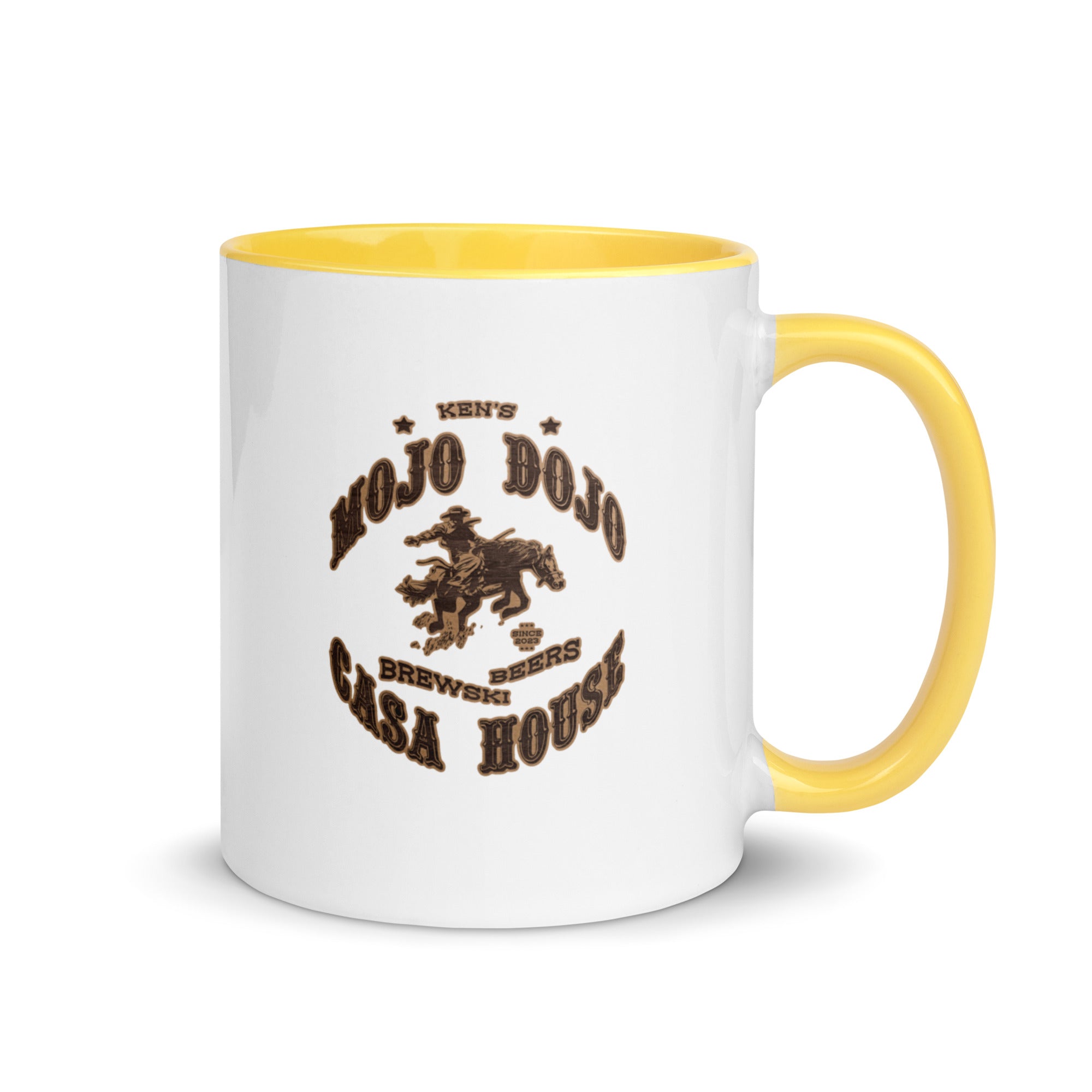 a yellow and white coffee mug with a horse on it