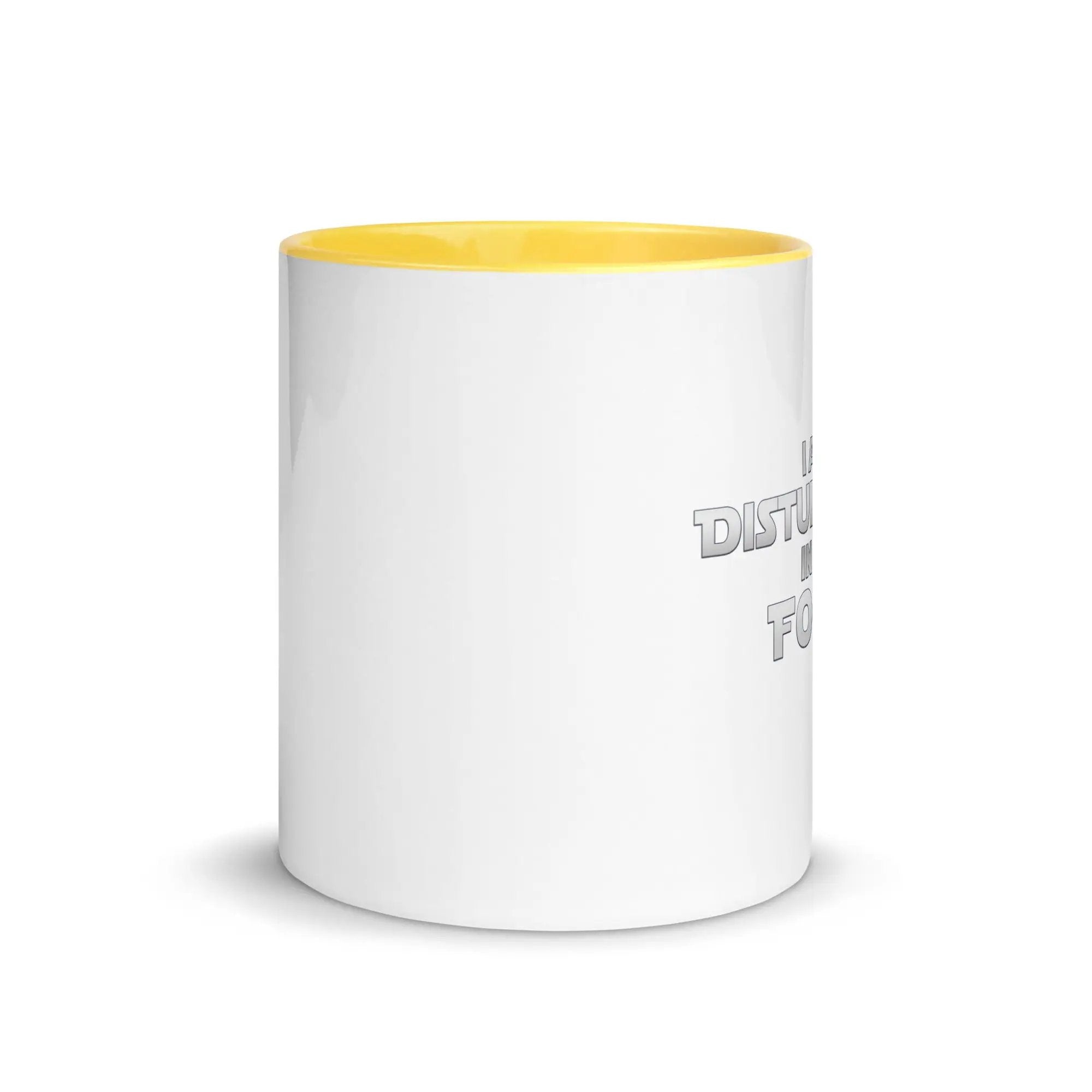 a white and yellow coffee mug with a yellow rim