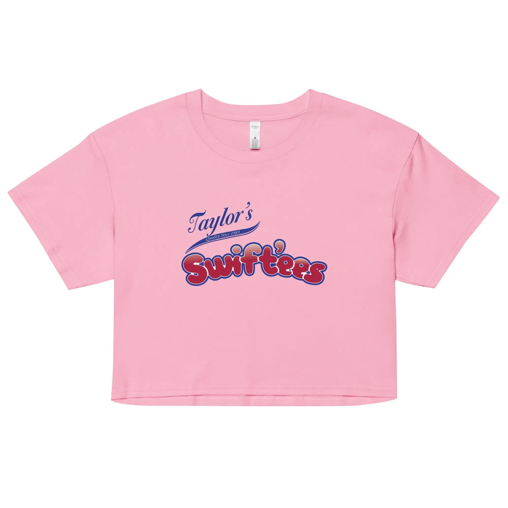 a pink t - shirt with the word taylor's on it