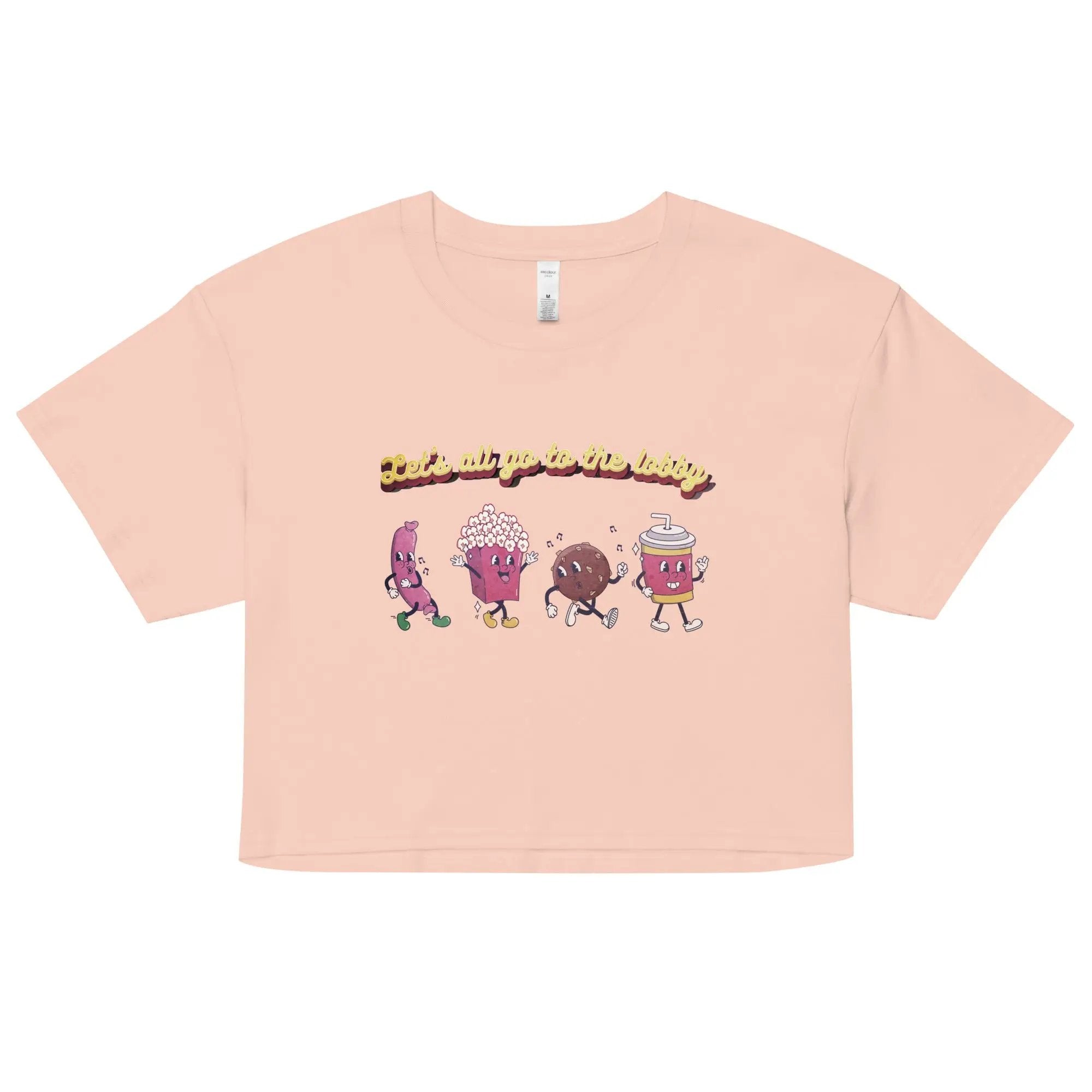 a pink t - shirt with cartoon characters on it