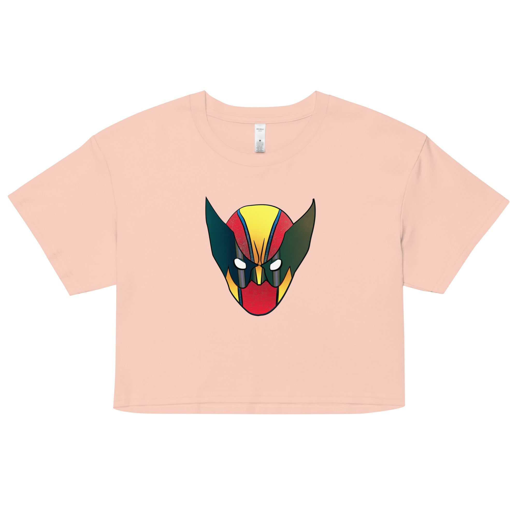 a pink crop top with a graphic of a demon's head