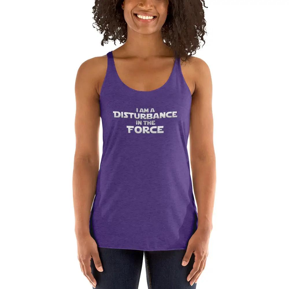 a woman wearing a purple tank top that says, i am a distance force