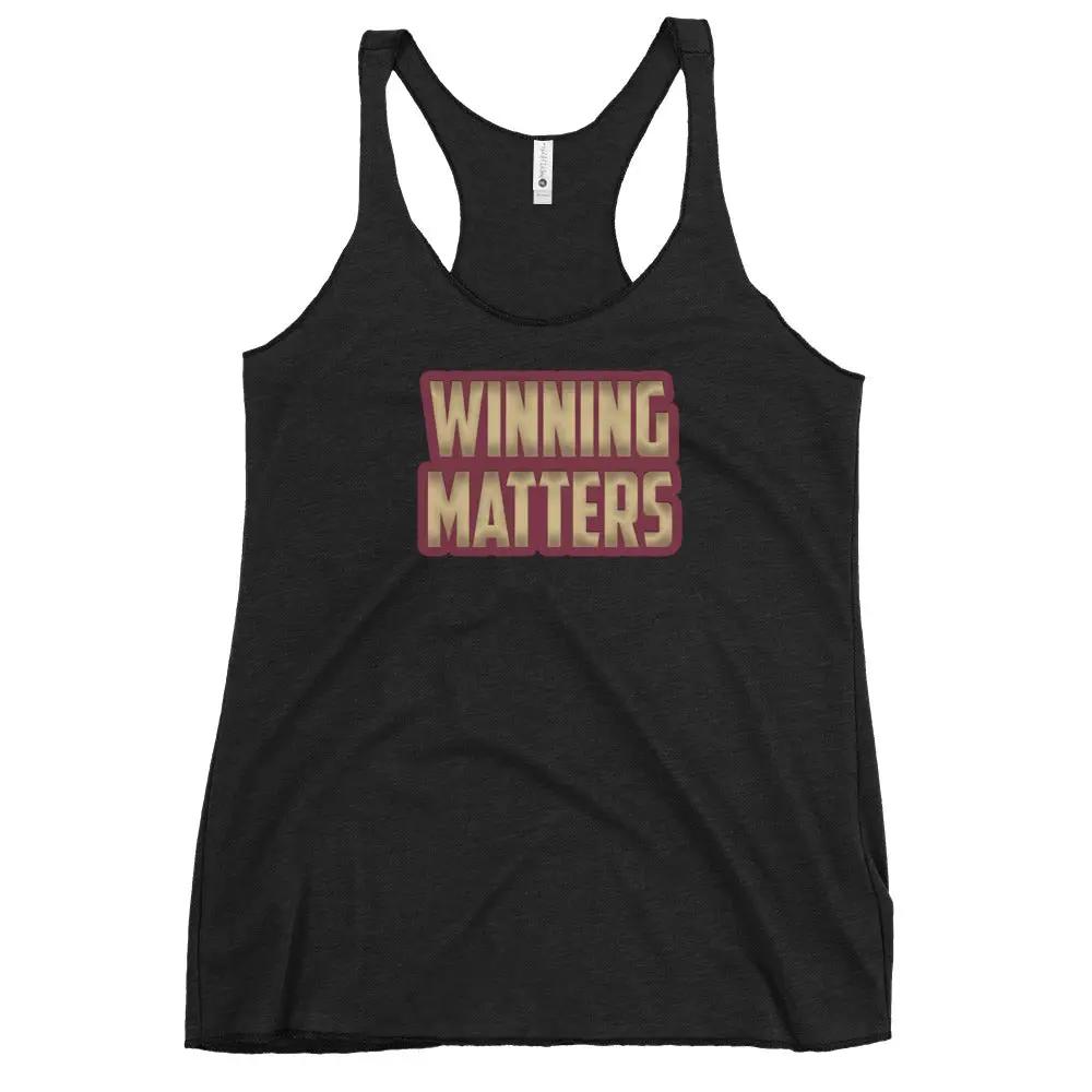 a women's tank top that says winning matters