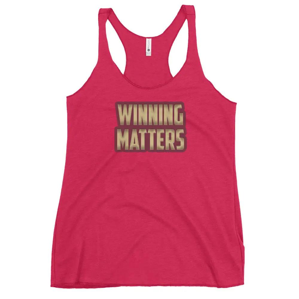 a women's tank top that says winning matters