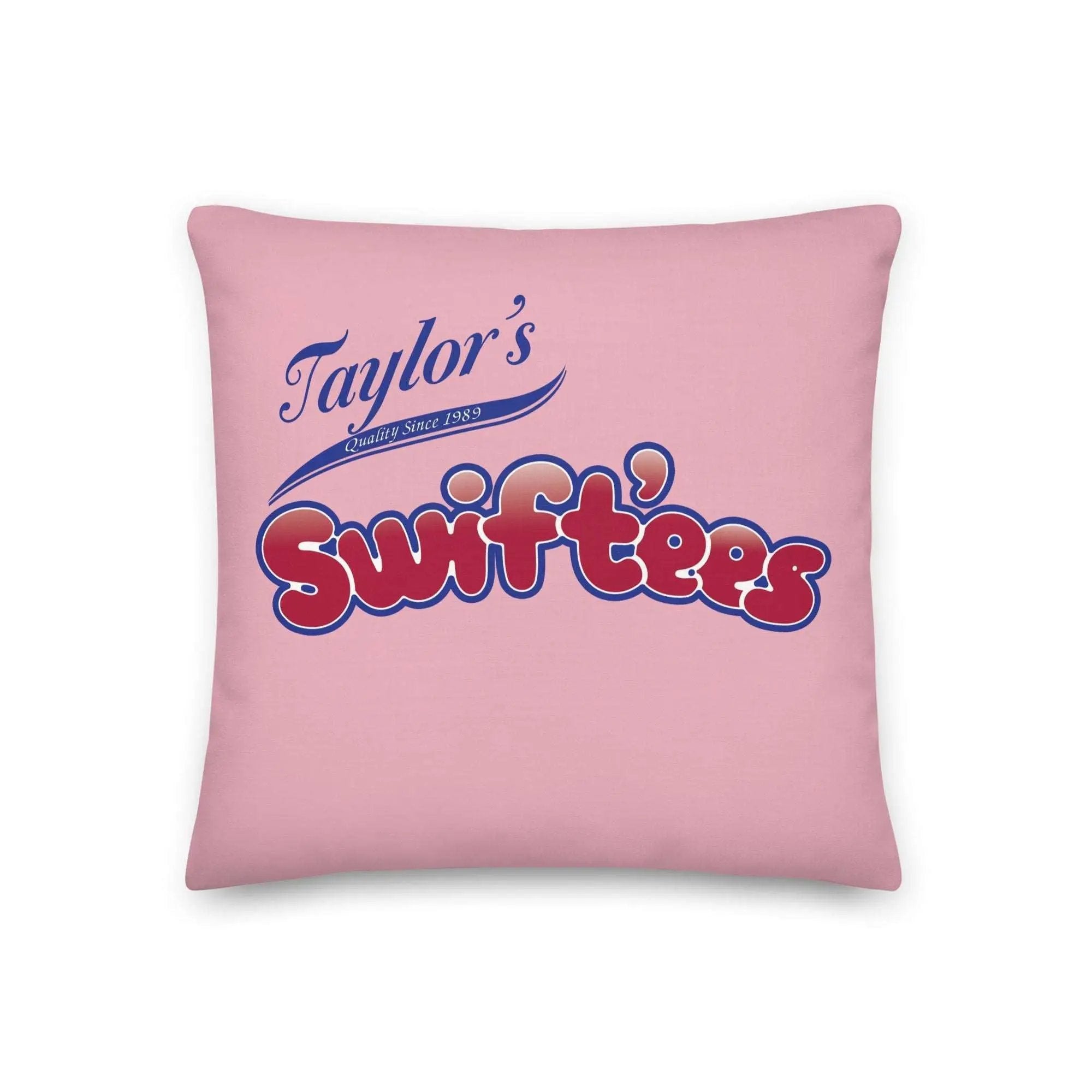 a pink pillow with taylor's swifties on it