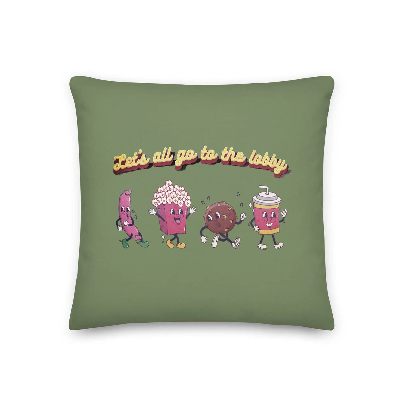 a green pillow with three cartoon characters on it