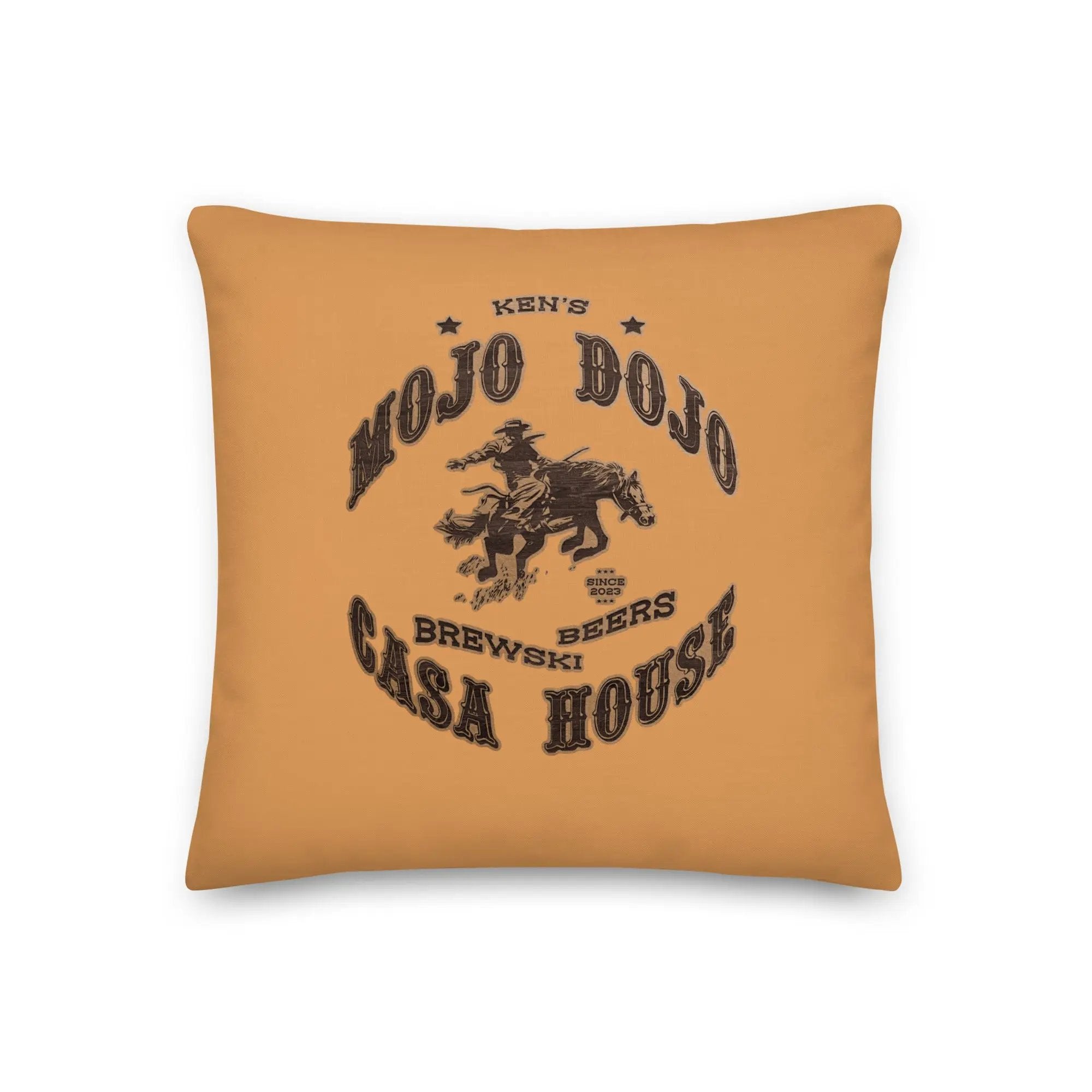 a yellow pillow with a cowboy on it