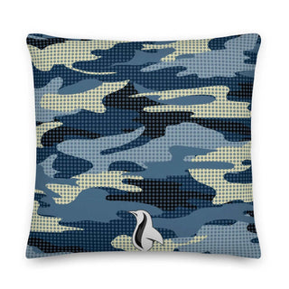a blue and white pillow with a bird on it