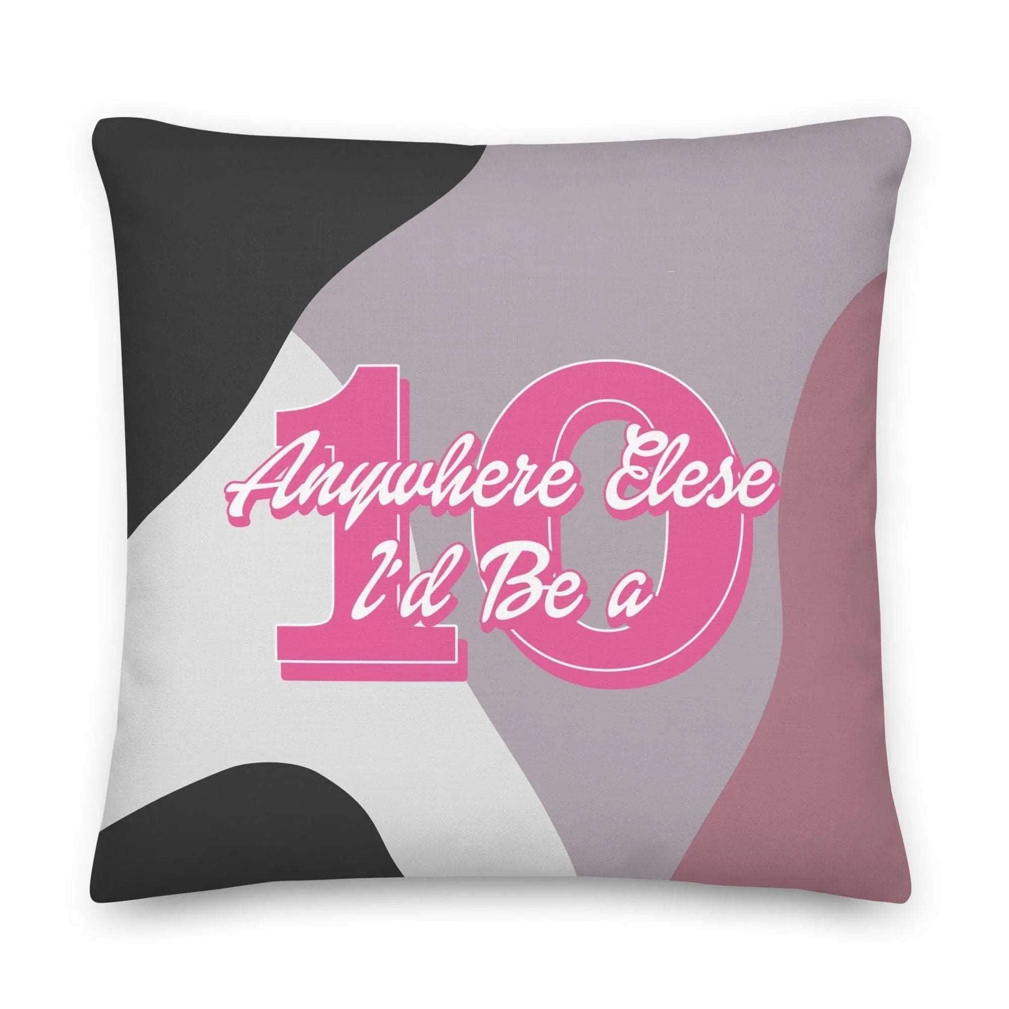 a pink and black pillow with the number ten on it