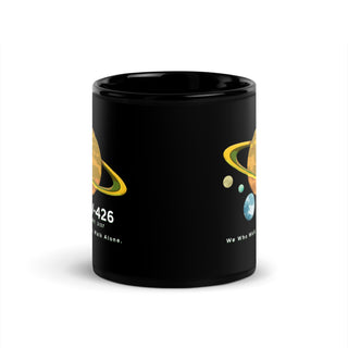 a black coffee mug with a picture of saturn on it