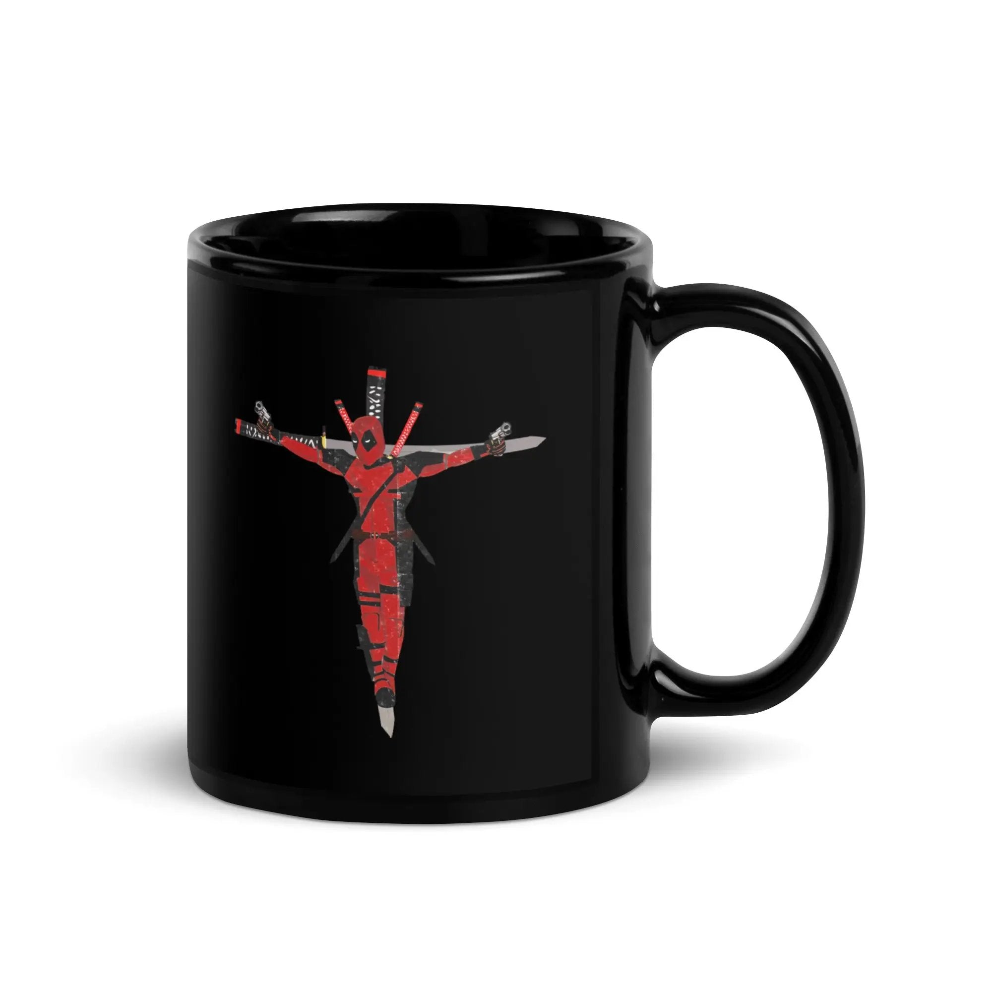 a black coffee mug with the image of jesus on it