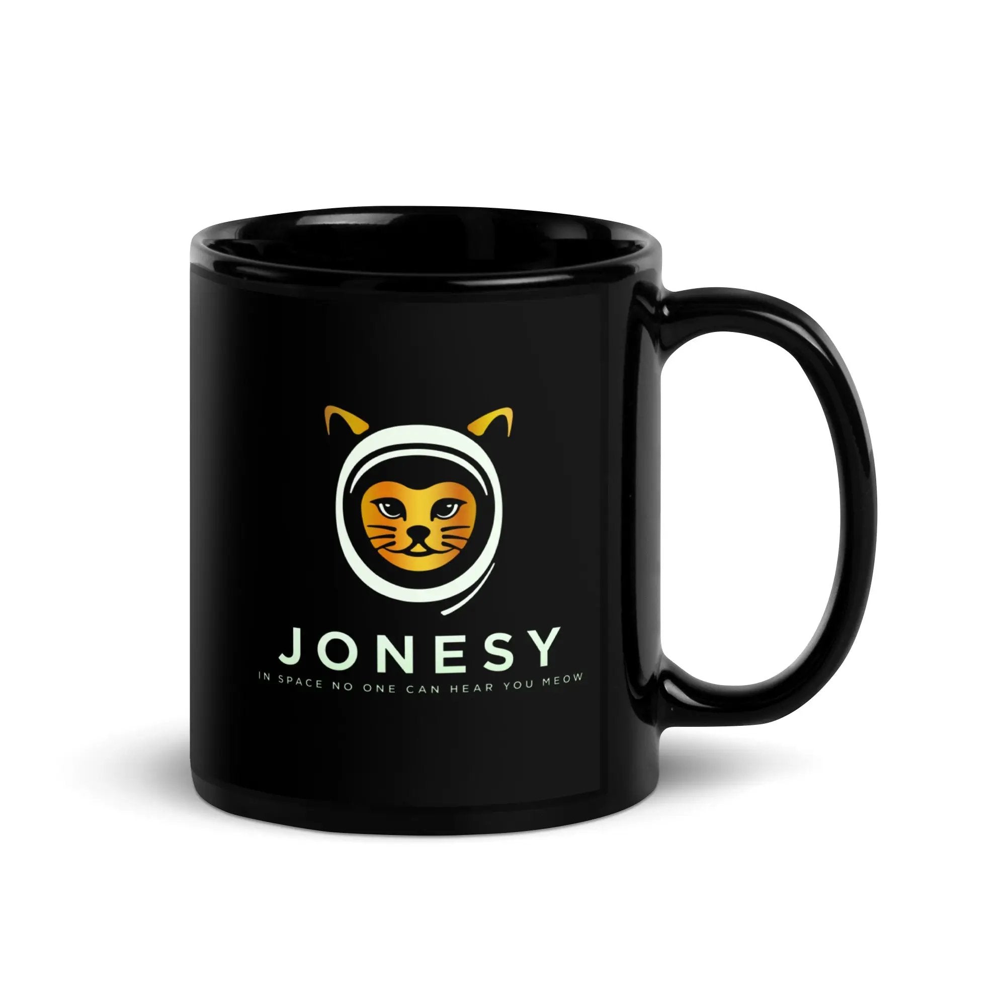 a black coffee mug with a cat on it