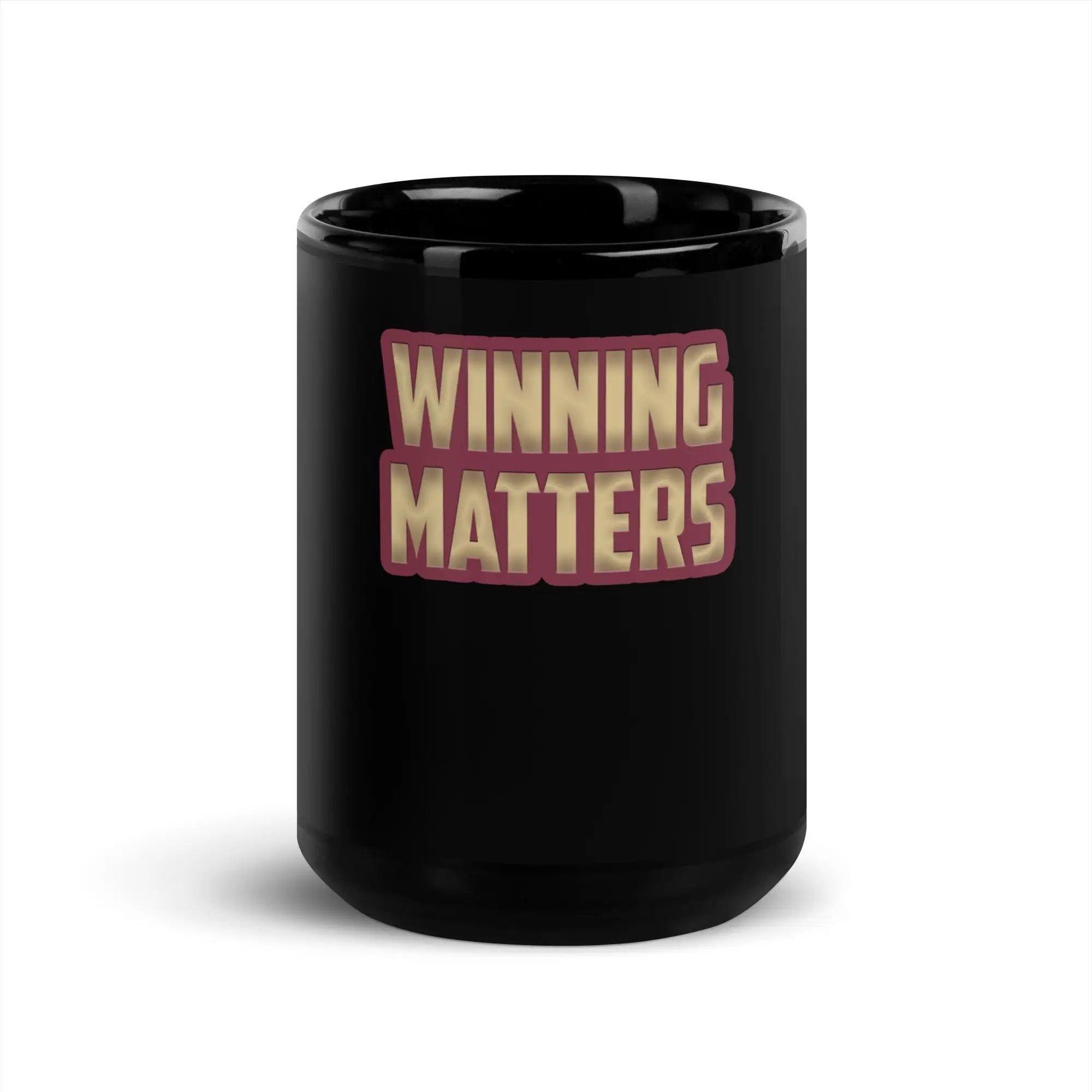 a black coffee mug with the words winning matters on it