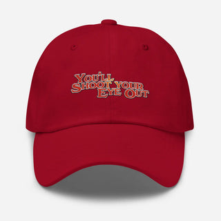 a red hat that says you shoot your eye out