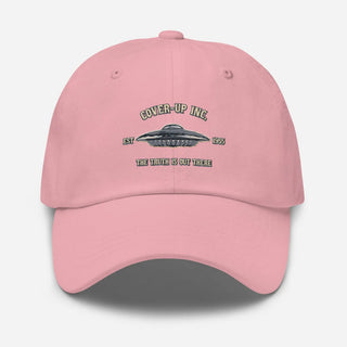 a pink hat with a picture of a flying saucer on it