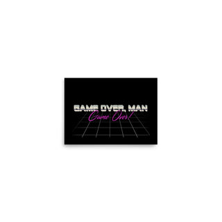 a black and white photo of a game over man logo