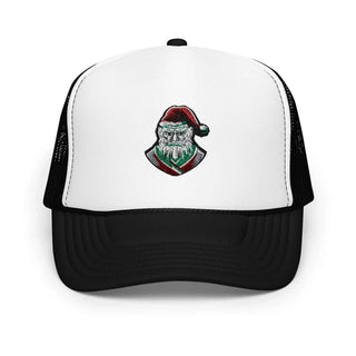 a white and black trucker hat with a santa clause on it
