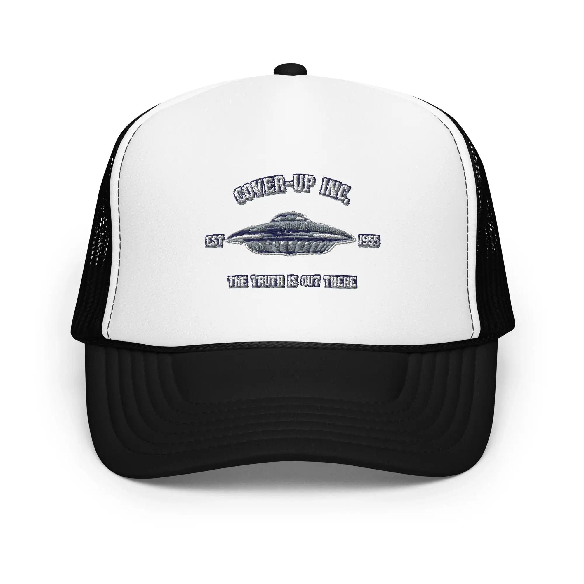 a white and black trucker hat with a black mesh back