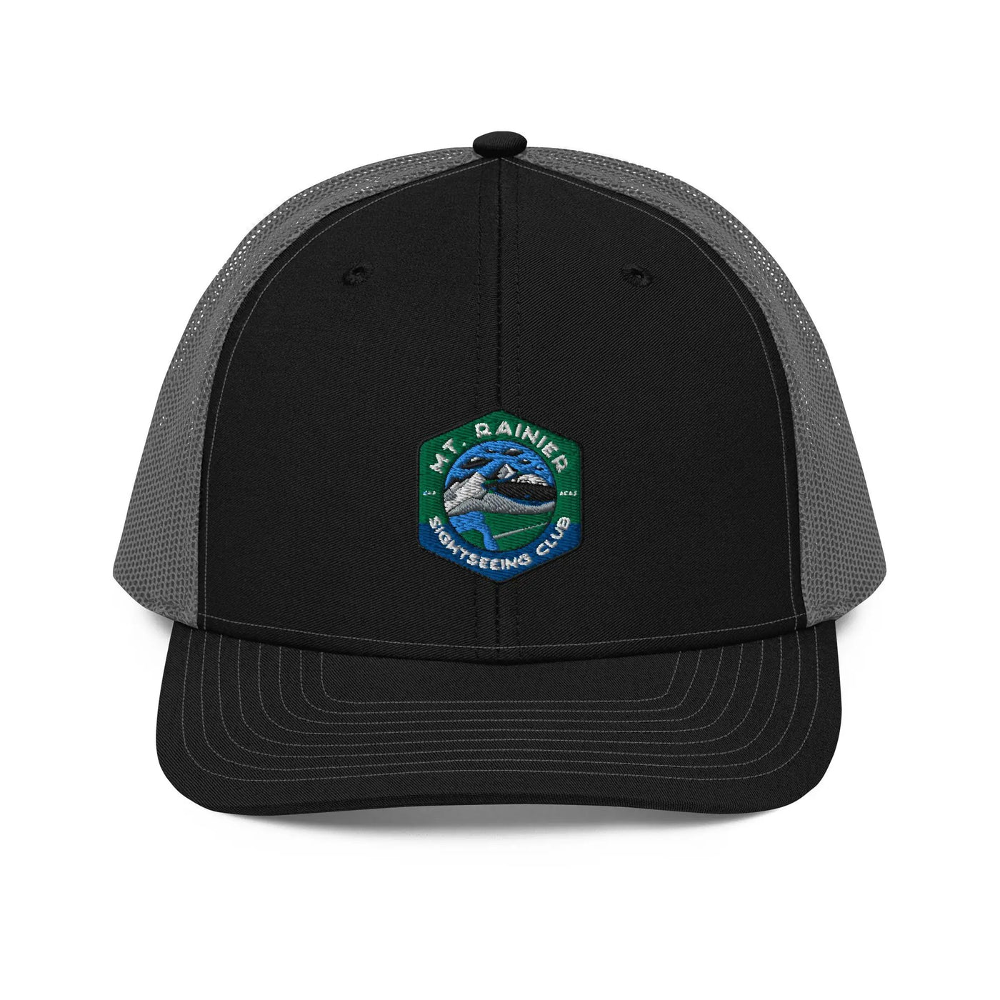 a black and gray hat with a green and white patch