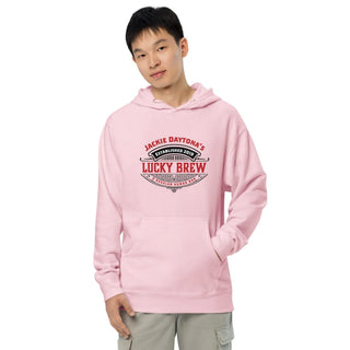a man wearing a pink hoodie that says lucky brew