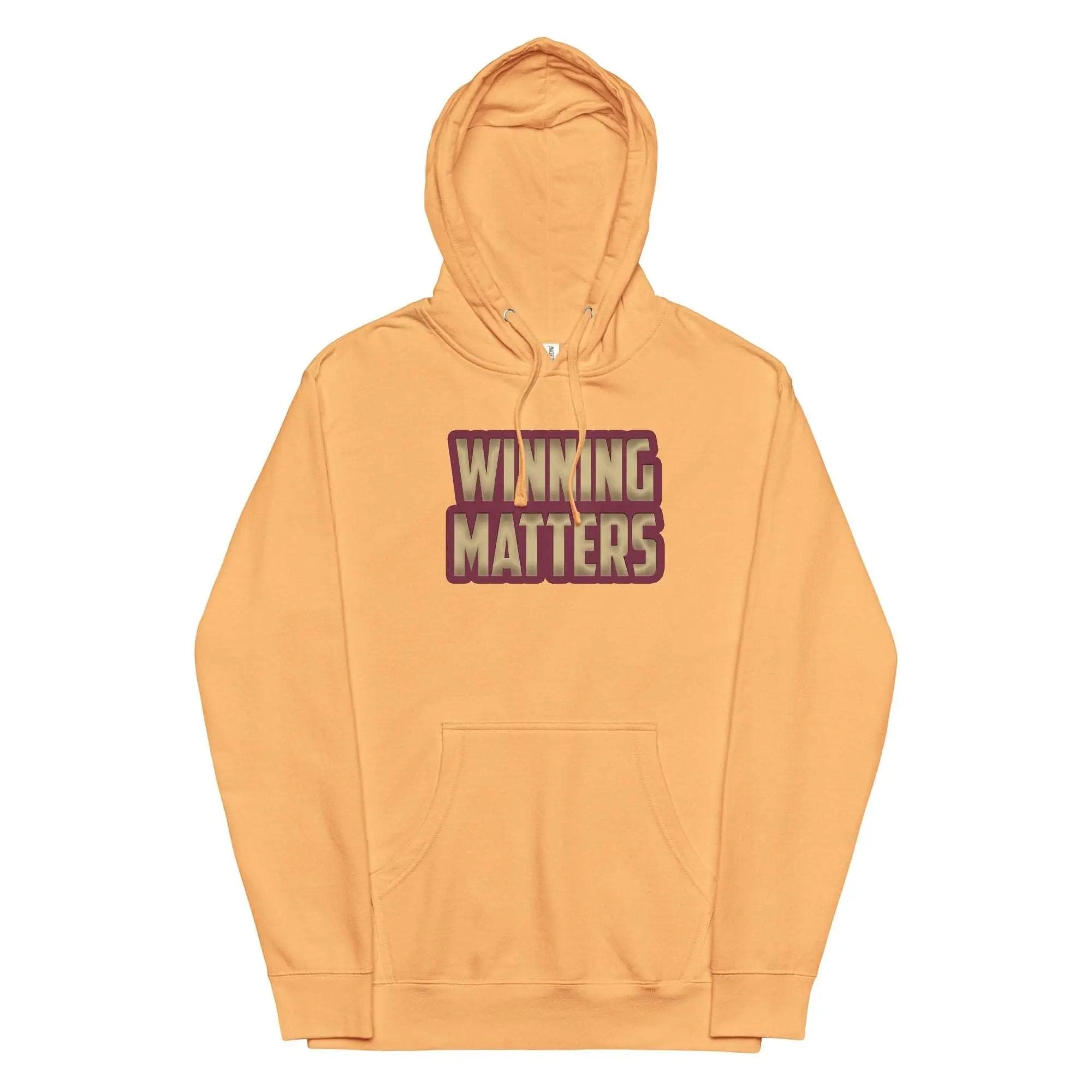 a yellow hoodie with the words winning matters printed on it