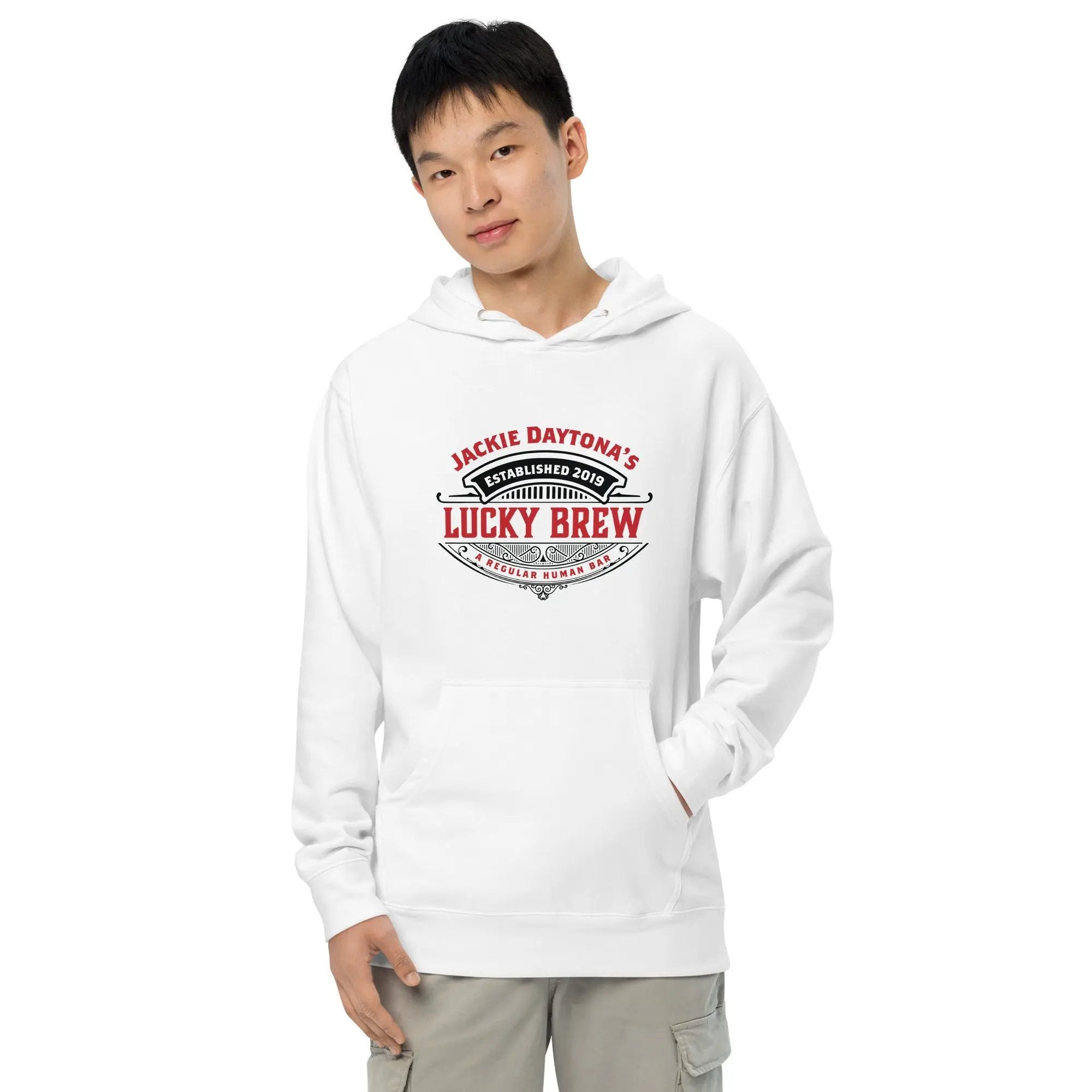 a man wearing a white hoodie with the words lucky brew on it