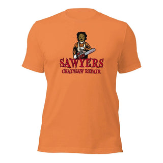 an orange t - shirt with a picture of a woman holding a chainsaw