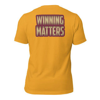 a yellow shirt with the words winning matters printed on it