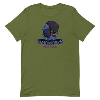a green t - shirt with an image of a dinosaur and the words xeno
