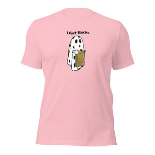 a pink t - shirt with a picture of a dog holding a piece of bread